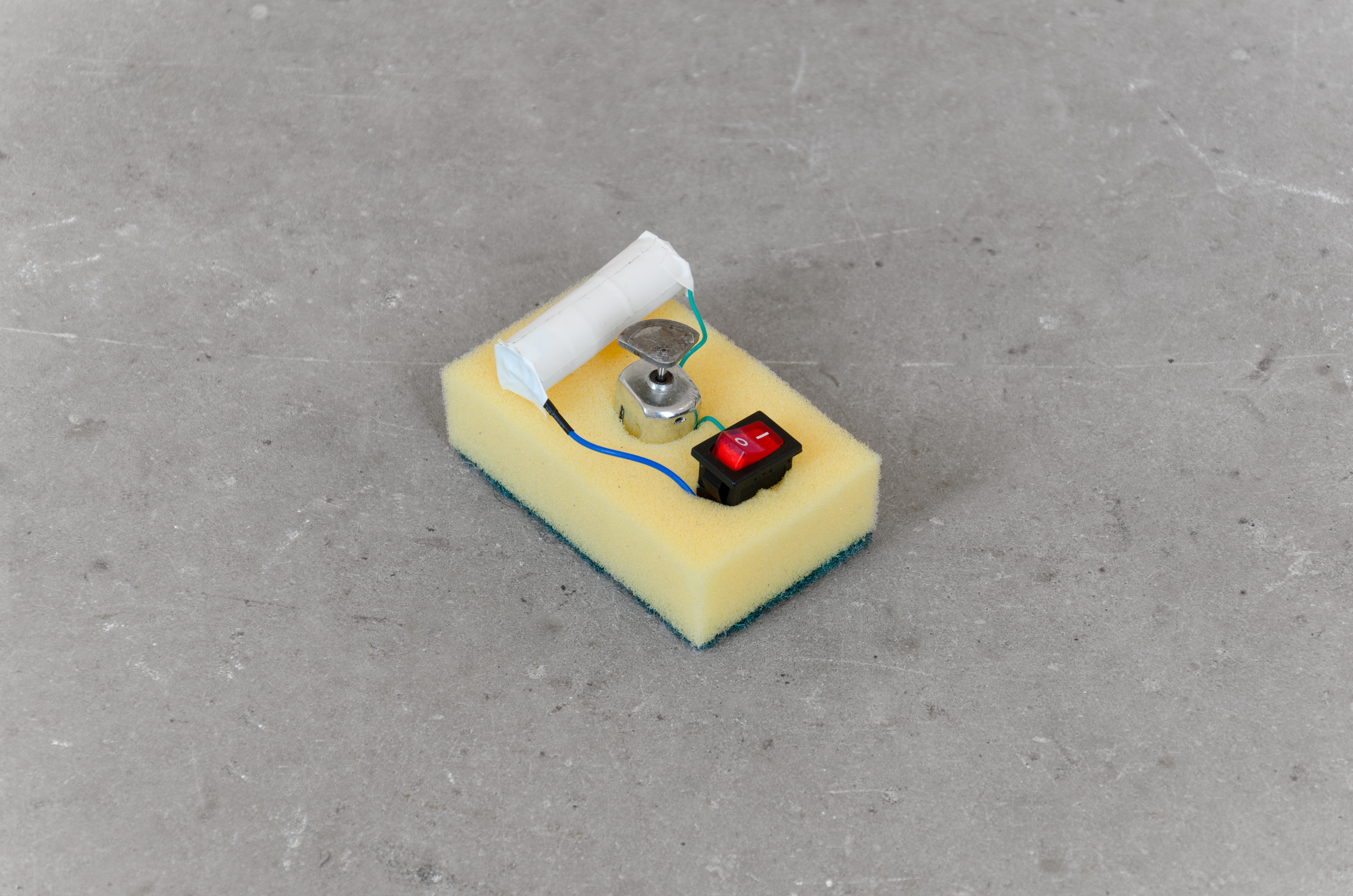 Sponge; Elinor Wadman, 2014; Sponge, battery, wire, switch; 4 × 9 × 5.5cm