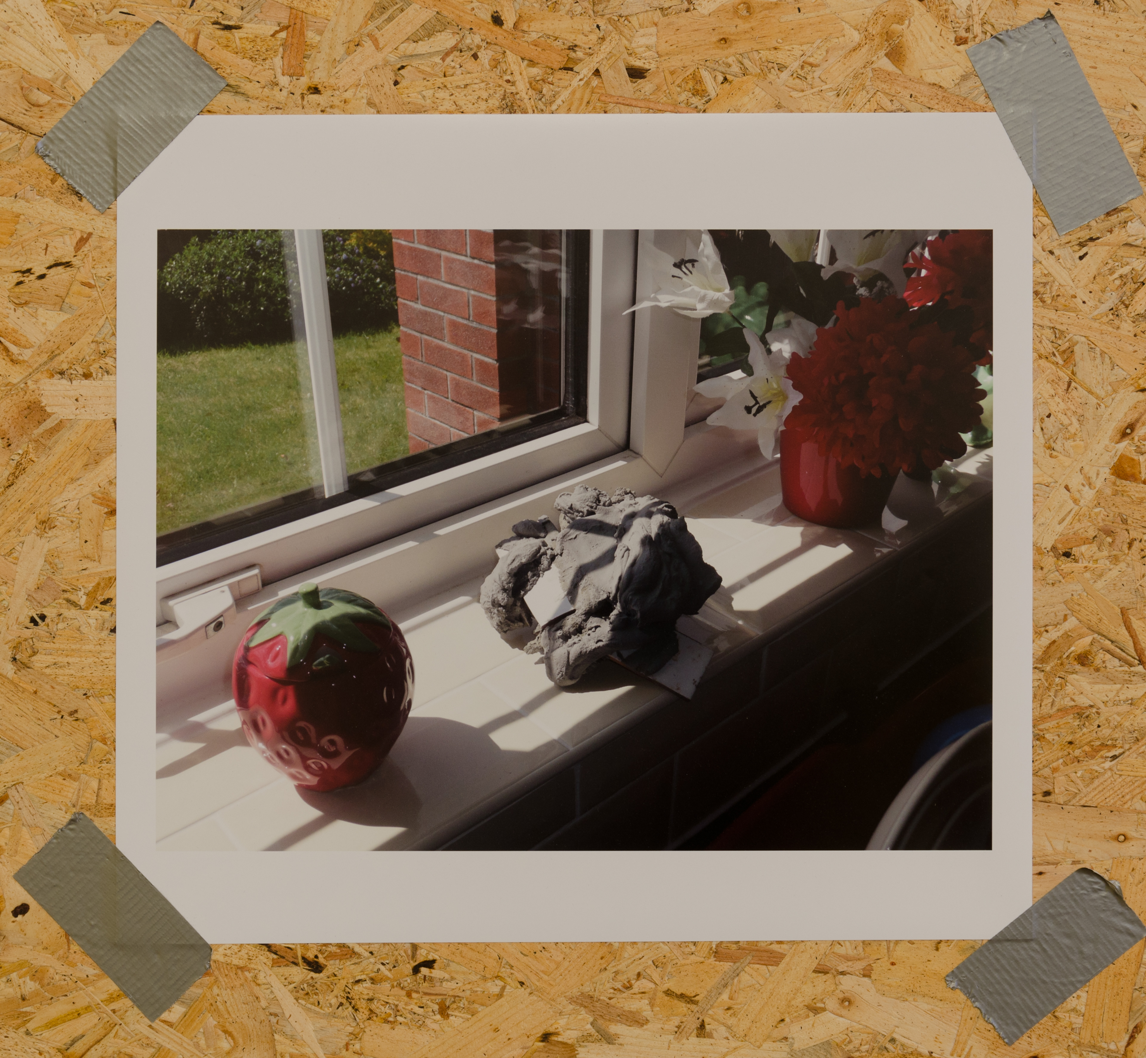 Manifestation of Deliverance Object 4: Unclean Energy Solidification of ‘Centre of the Earth’; 2007; photograph mounted on board; 55 × 41cm; Pictured in the house of Mr and Mrs Allsop, Rotherham, who acquired it in May 2010 in Carthage, Tunisia, from Peter Lister