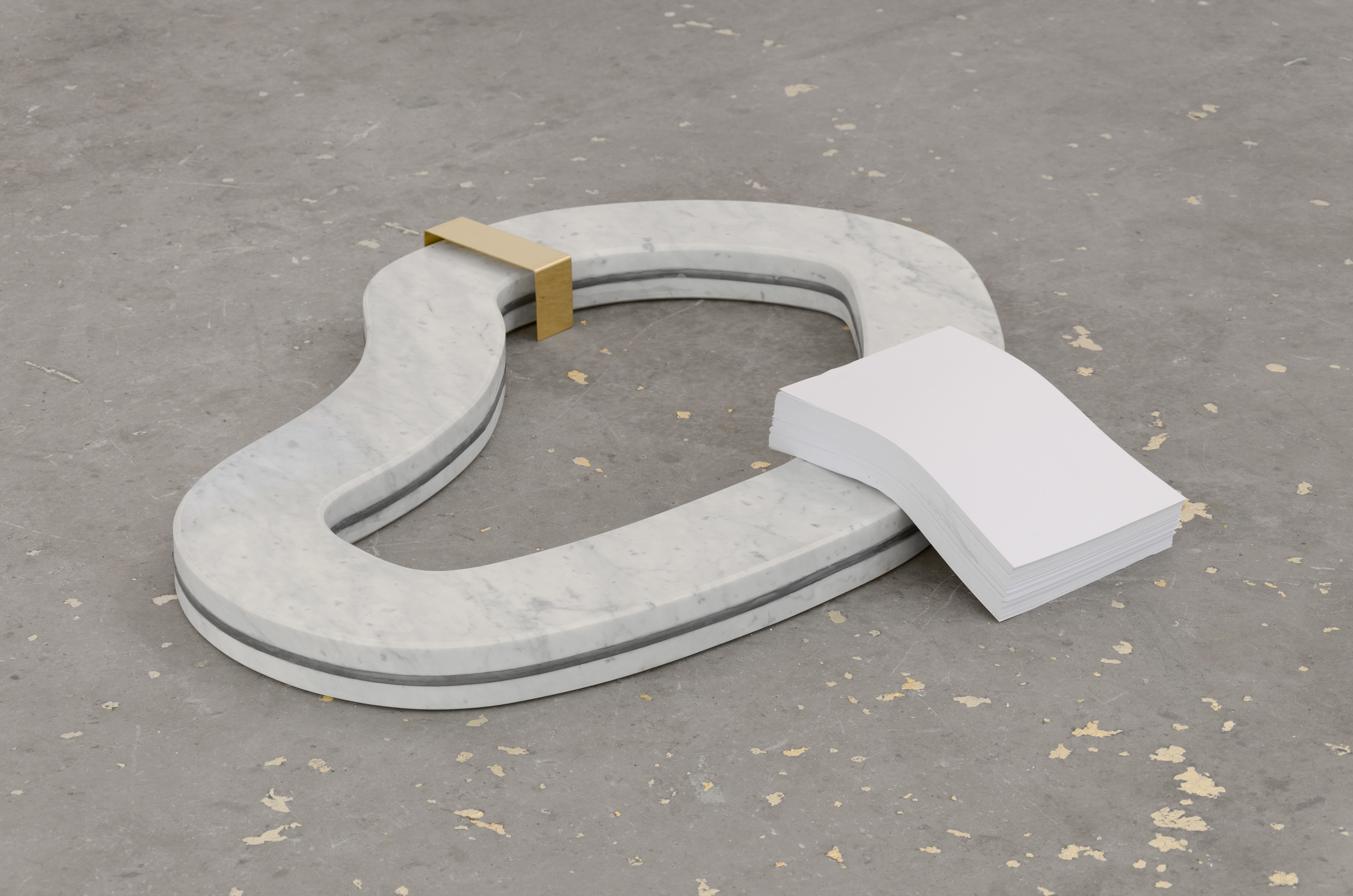 “...thereof one must be silent”; Eleanor Elks Herrmannsen, 2015; marble, ream of white A4 paper, brass staple; 10 × 98 × 88cm