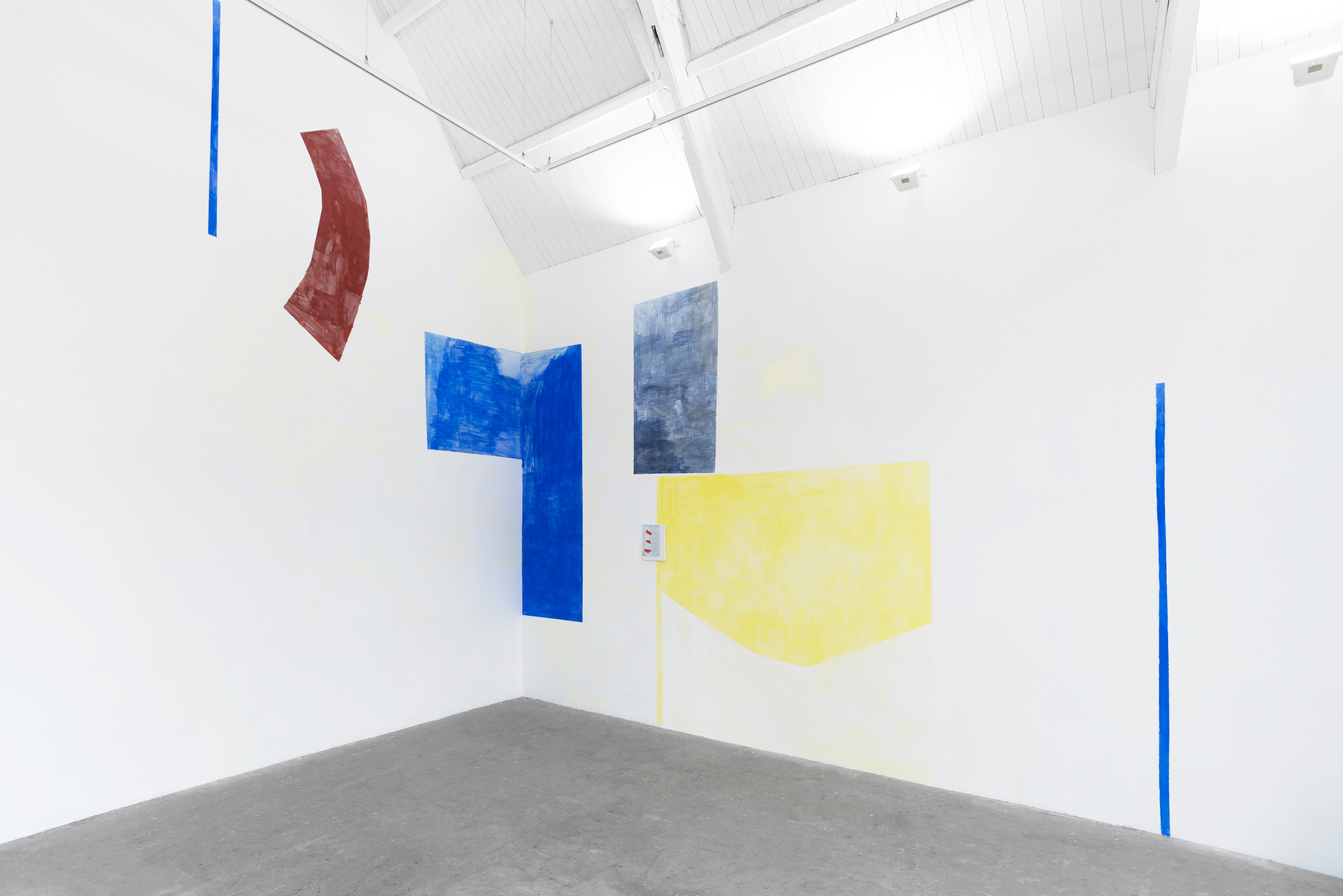 Blue wagons being painted red, or; Marije Gertenbach because of Holly Beer, Jess Eastwood, Georgia Holman and Michelle Leck, 2016; silicate paint on the wall; dimensions variable