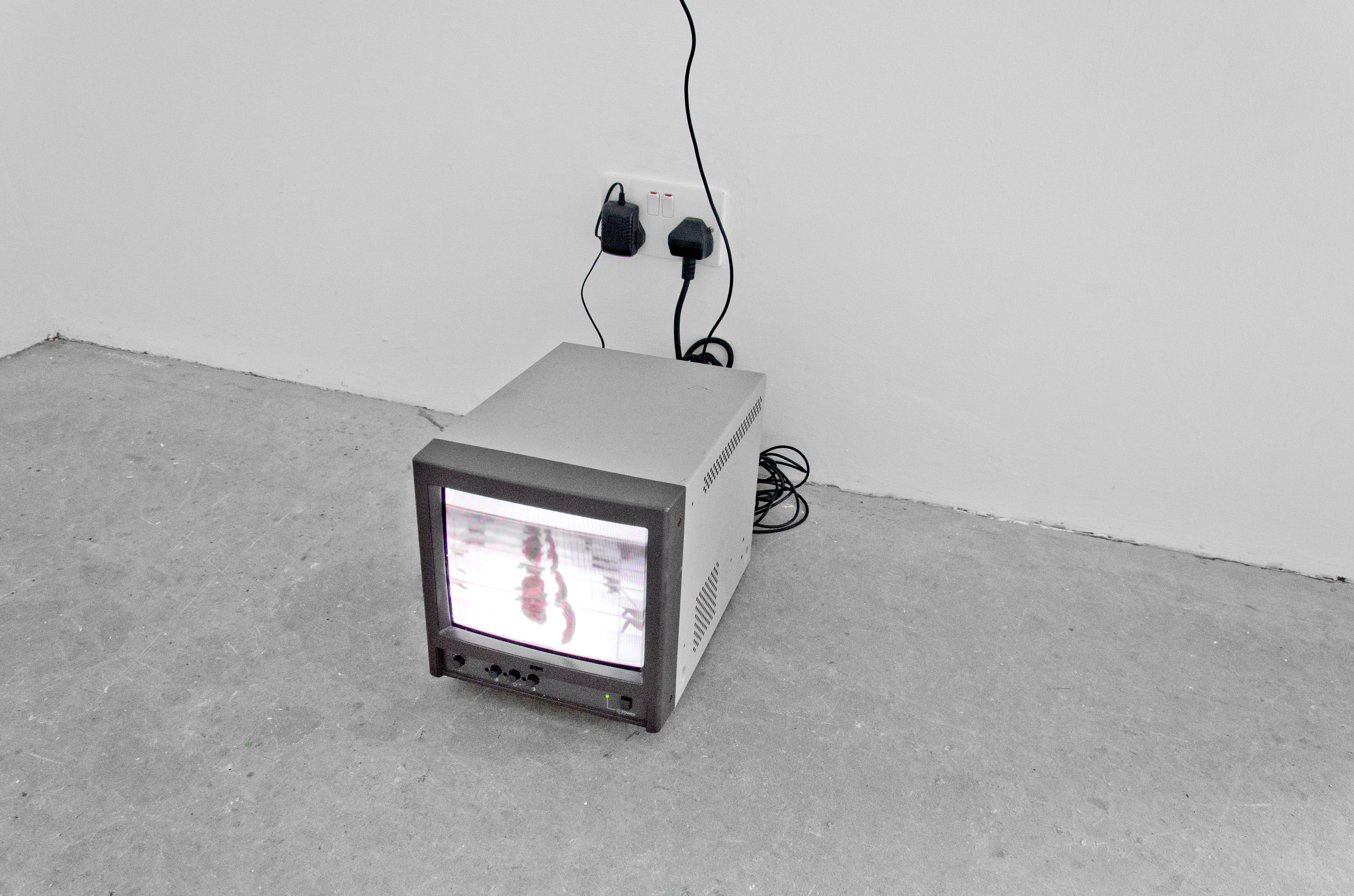 Poseidon's Head; Robin Jenkins, 2013; wax, CCTV camera, CCTV monitor; dimensions variable