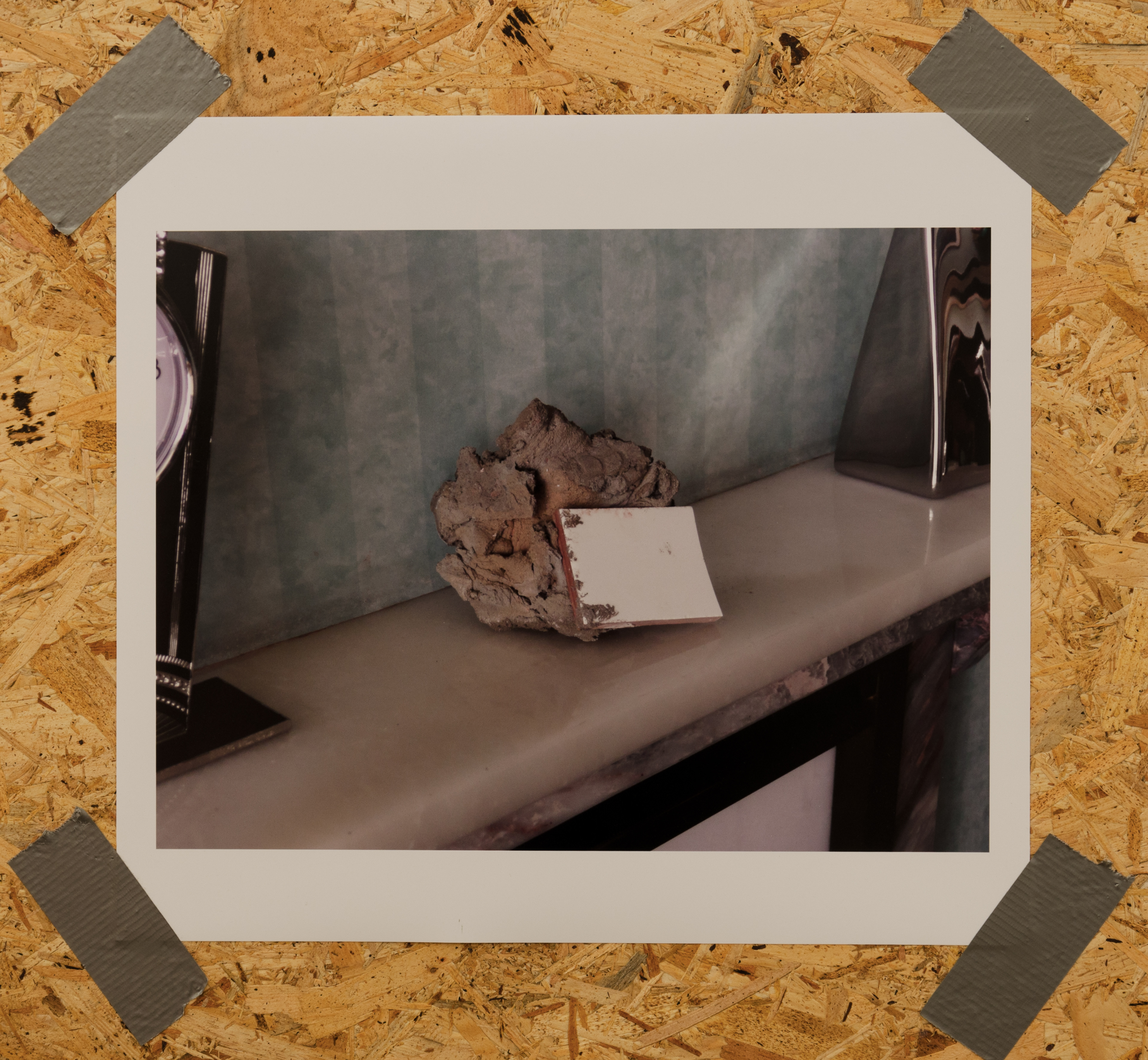Manifestation of Deliverance Object 11: Unclean Energy Solidification of ‘Damien Acetylcholine’; 2009; photograph mounted on board; 55 × 41cm; Pictured in the house of Mr and Mrs Dunleavy, St. Andrews, who acquired it in July 2011 in El-Jem, Tunisia, from Peter Lister