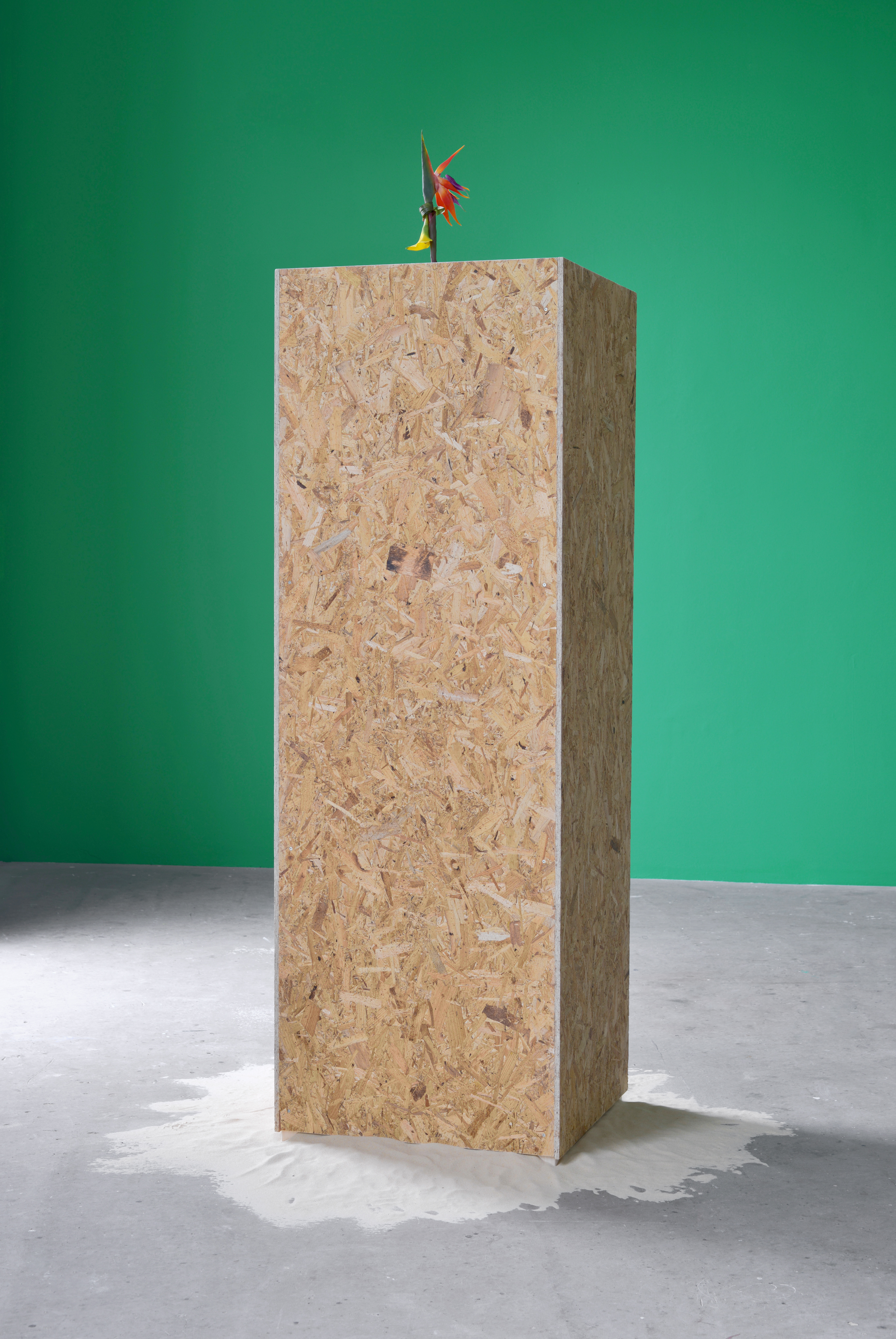 He pulled the mirrors off his Cadillac - YEAH - 'cause he doesn't like it looking like he looks back...; The Hut Project, 2013; The Hut Project, The Baroness, 2012, Artificial flowers arranged by Xanthe Edmunds, stolen log, oversize acrylic wine glass, beach sand; Drilled OSB board; 210 × 160 × 150cm approx.