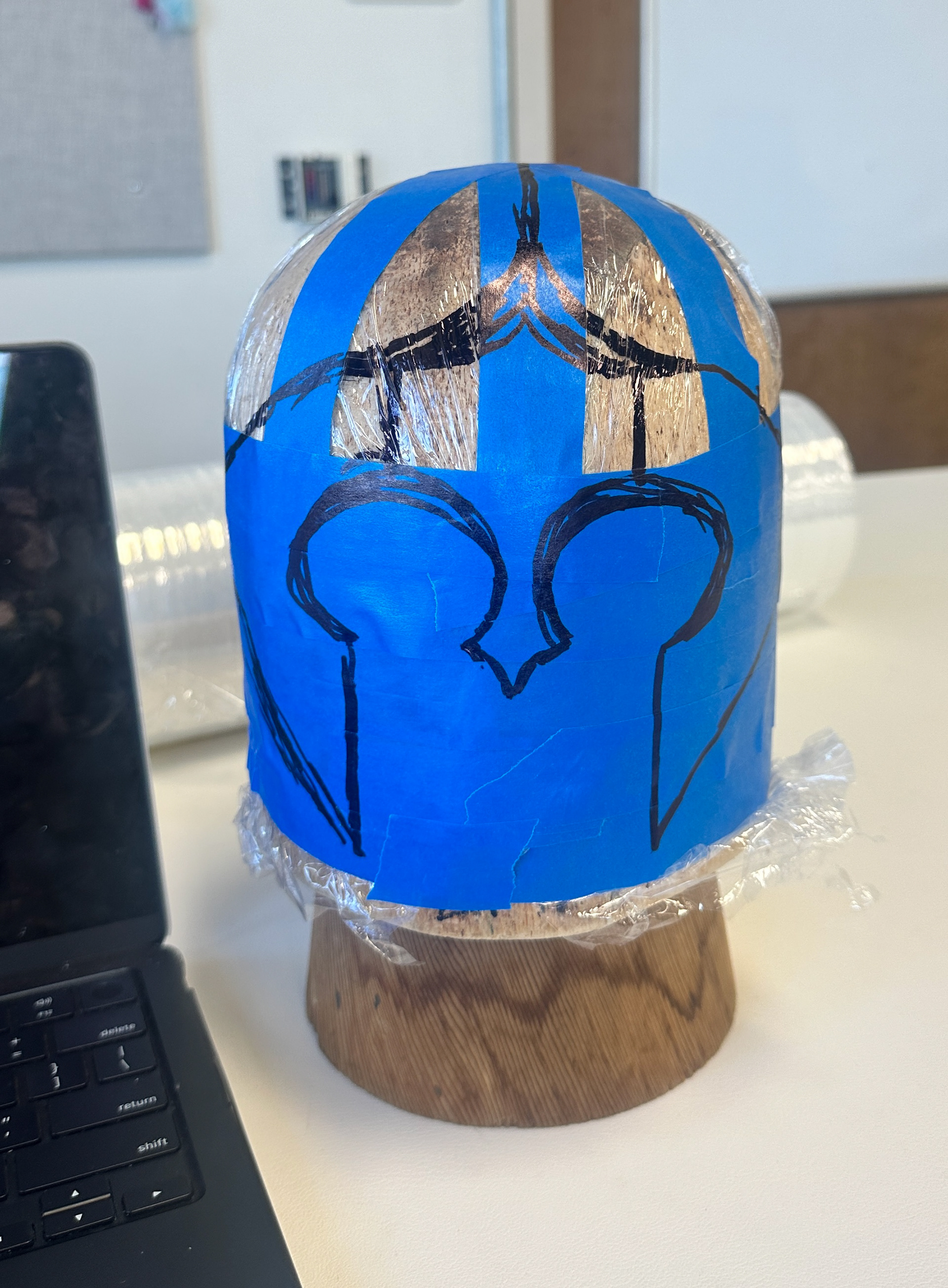 begun by drawing out lines on a balsa block