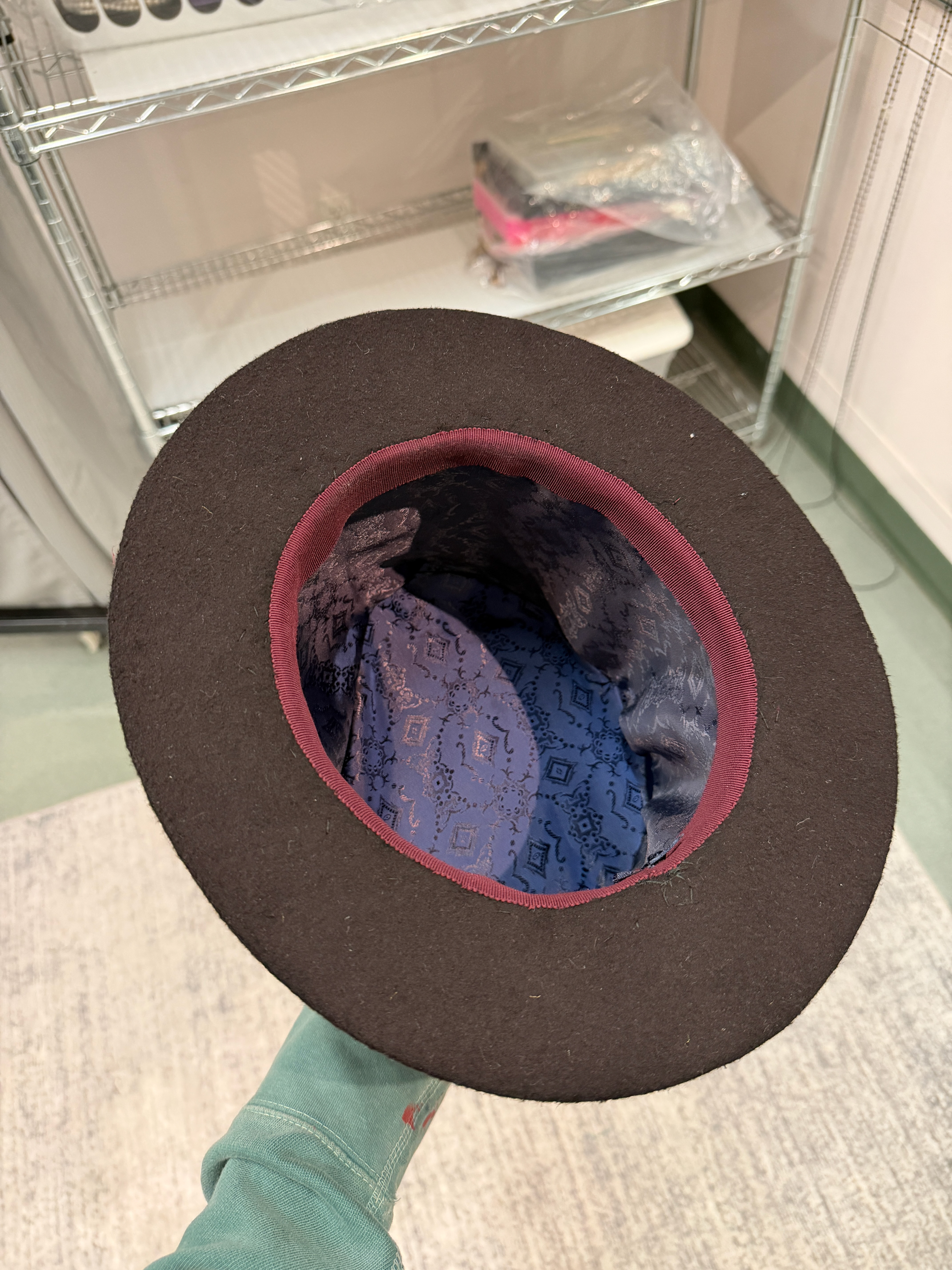 tailored lining and hand sewn head size ribbon