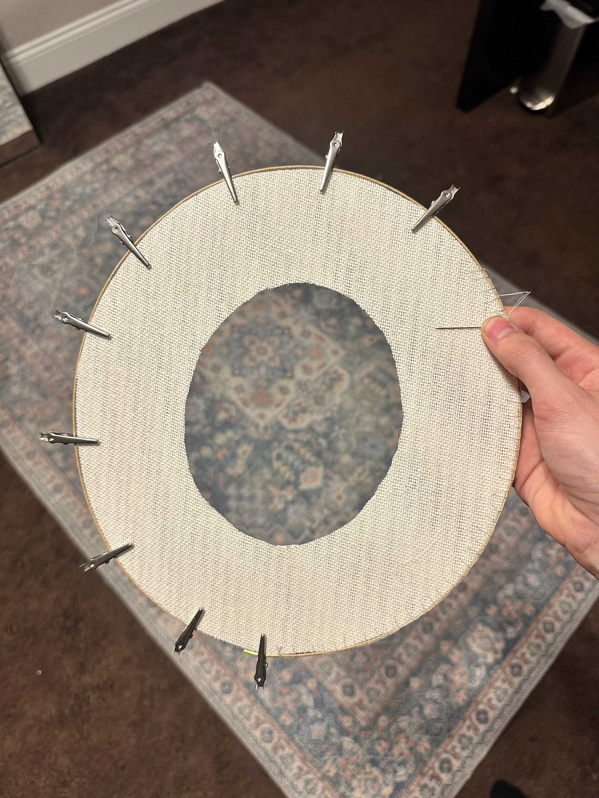 3-ply buckram brim with wire hand sewn at outer and inner edges using wiring stitch