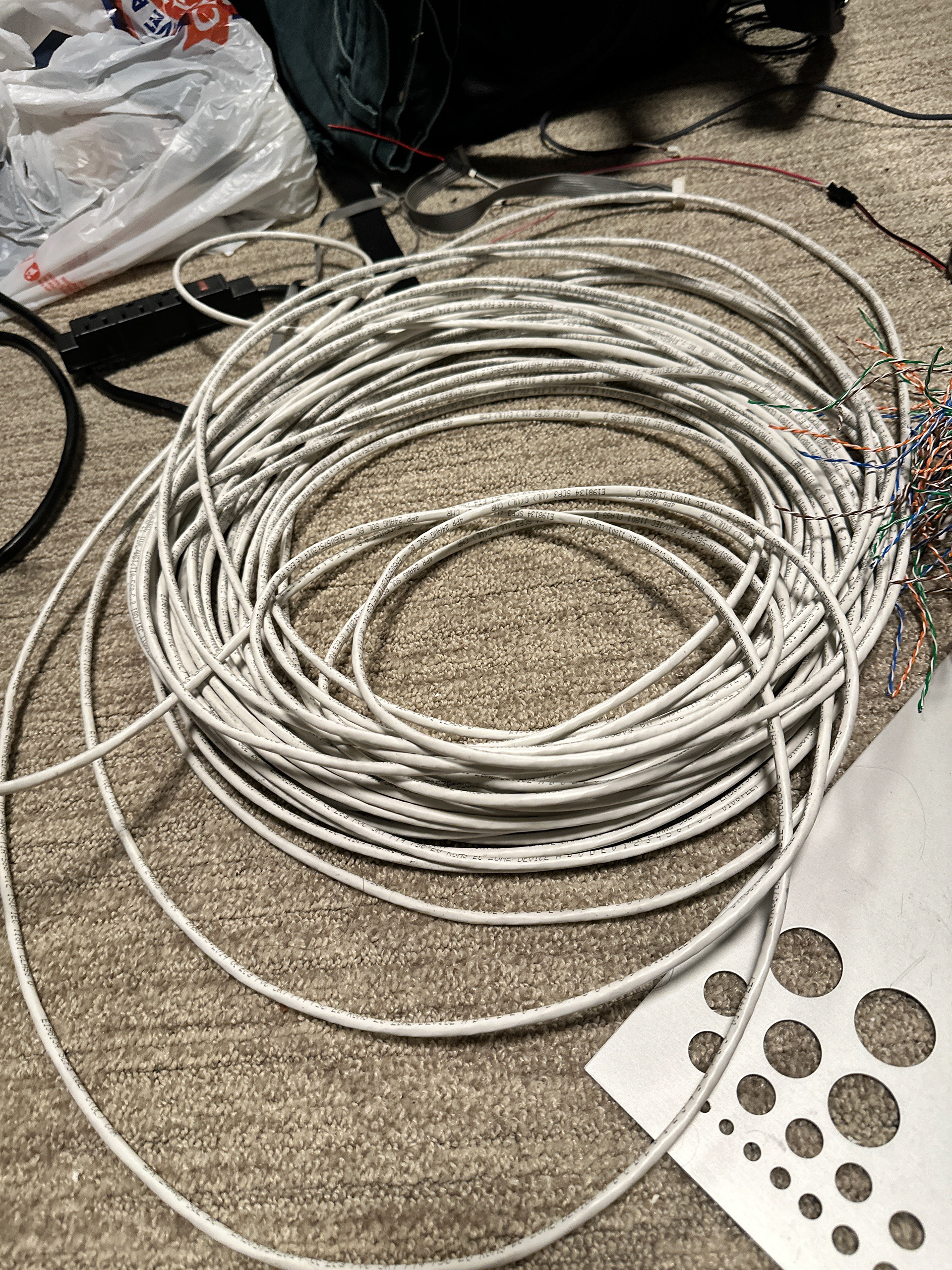 I was also donated this cable that I cut up, unsheathed, and hand sewed onto a blazer as fringe