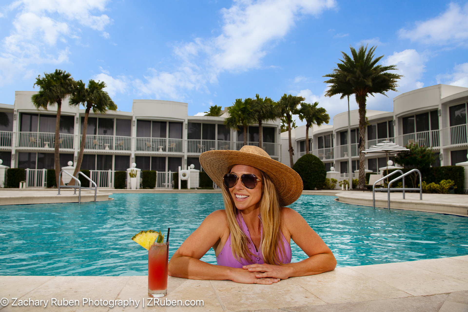 Woman Enjoying Beverage in Pool at Renaissance Orlando Resort