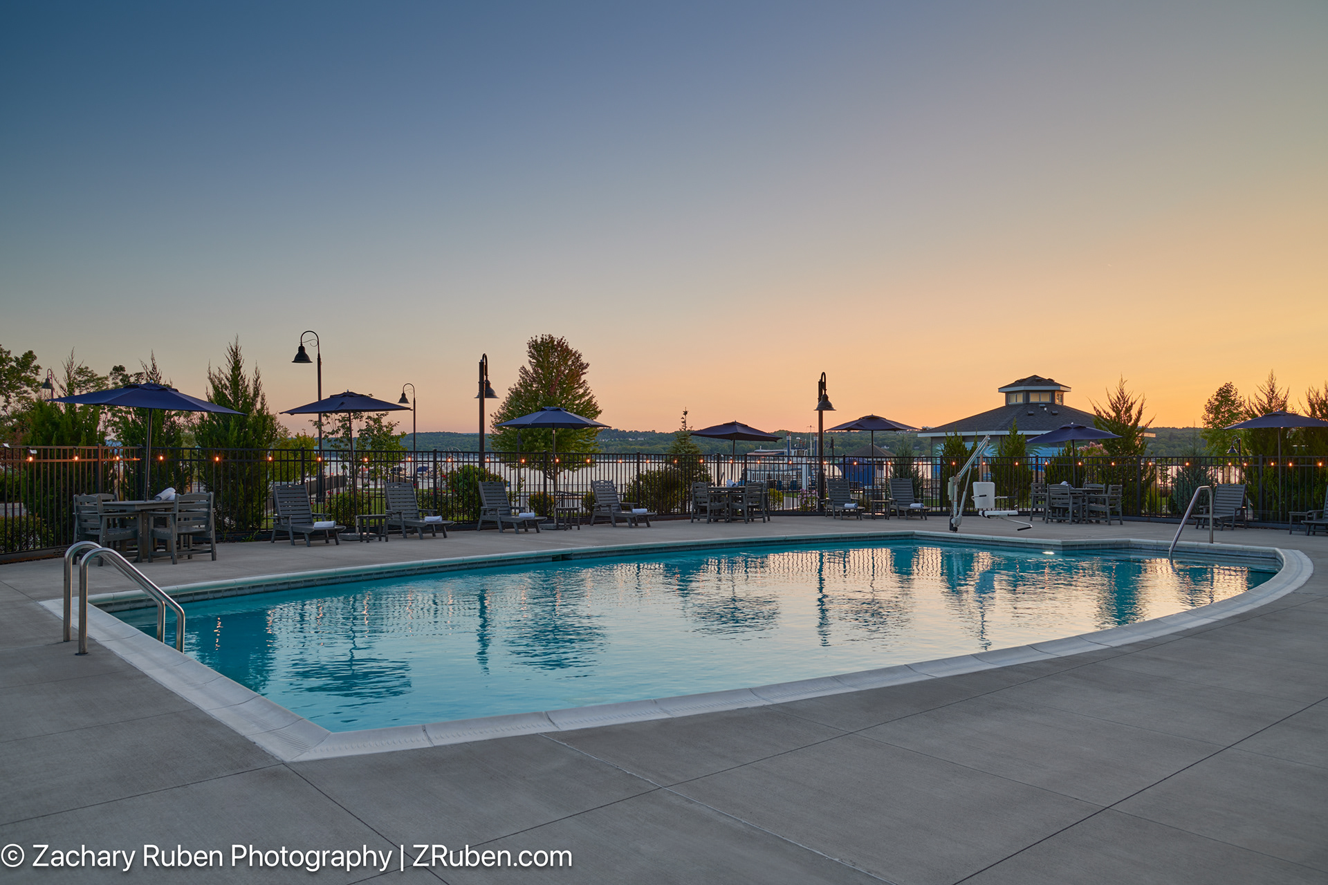 Outdoor Pool at Dusk at Hotel Canandaigua, Tapestry Collection by Hilton