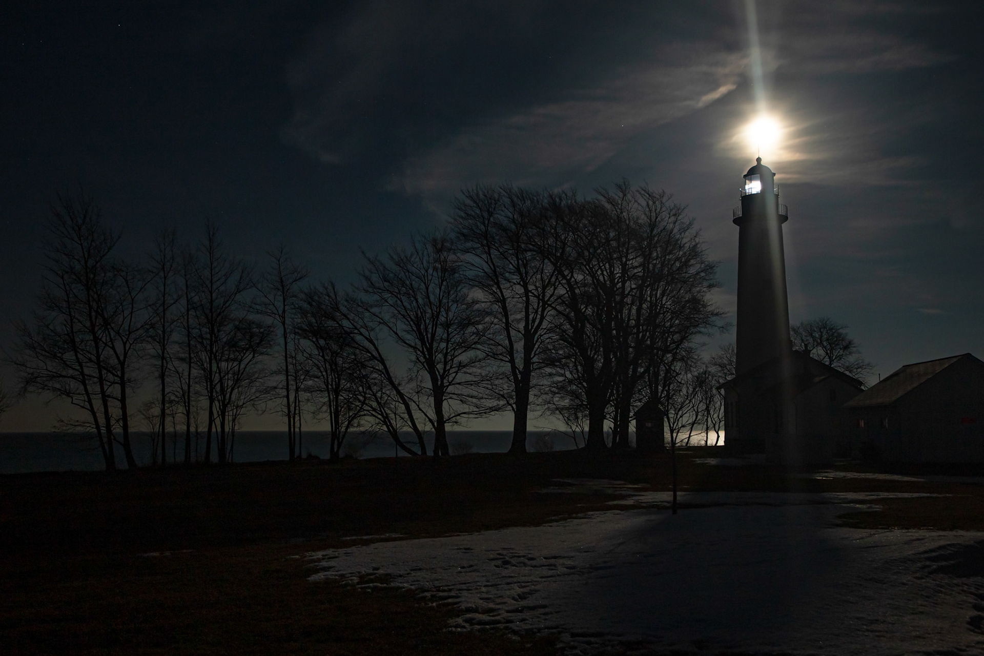 Lighthouse in Shadow with beacon light
