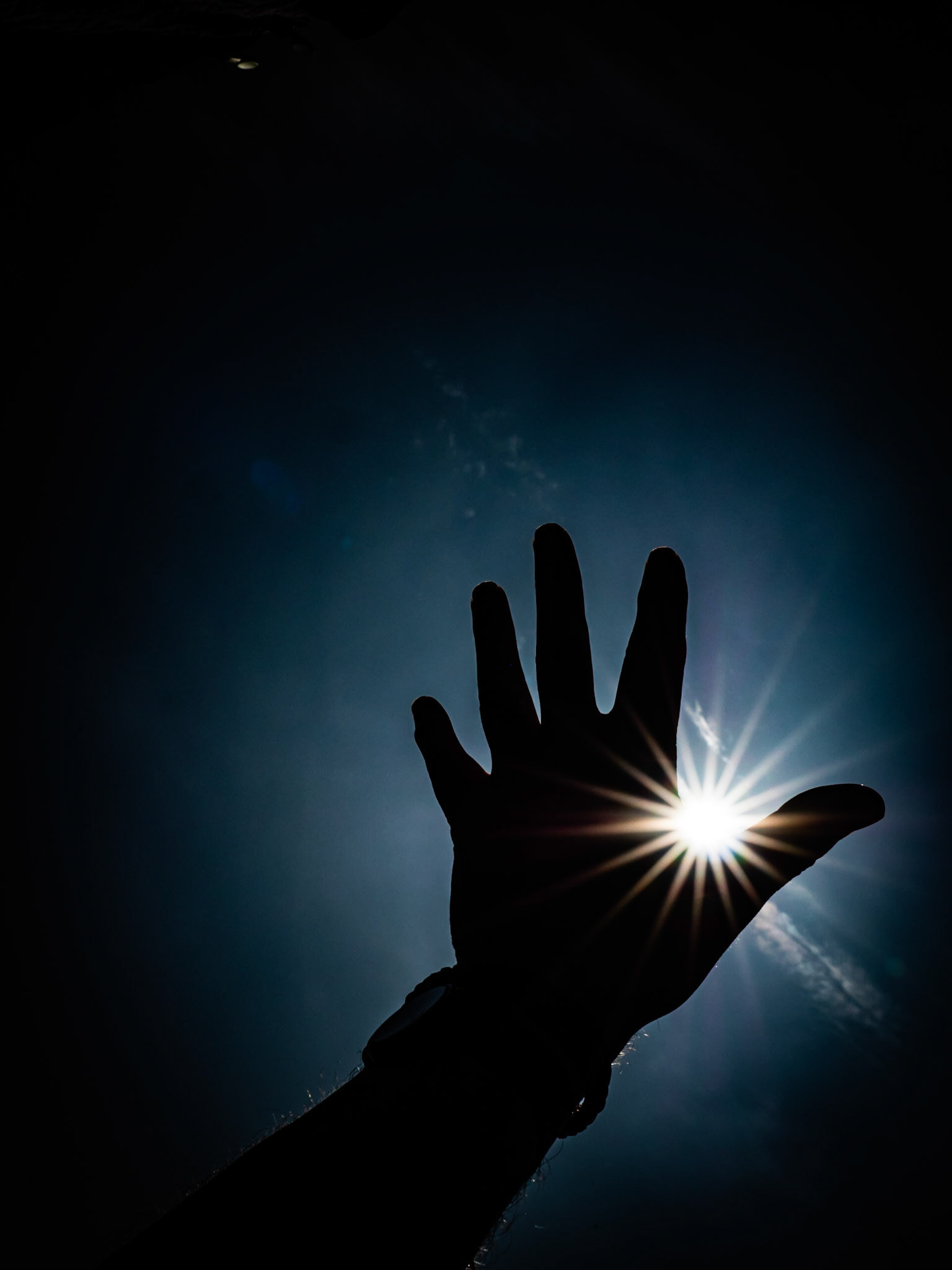 Hand and sun