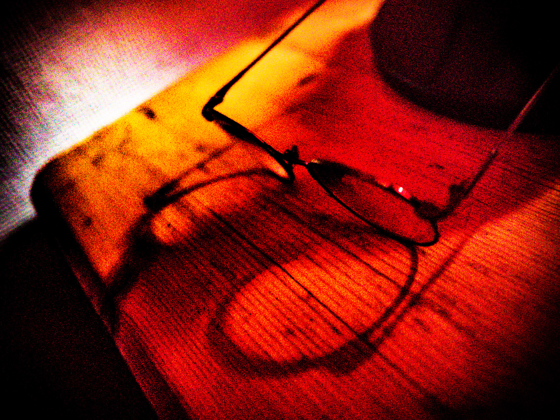 Glasses on a bedside table