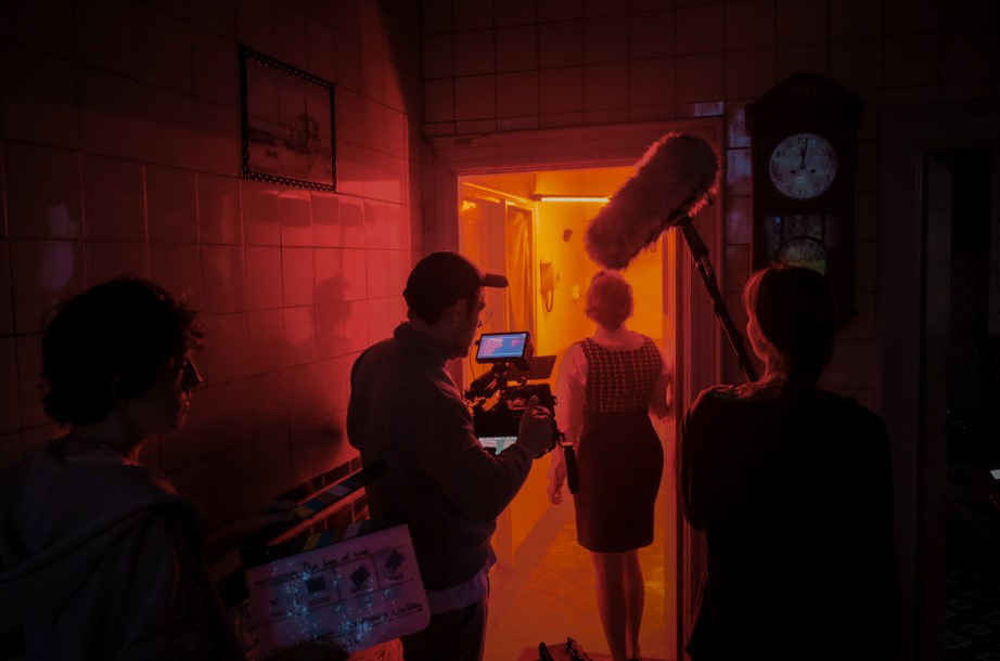 Behind the cameraman during the production