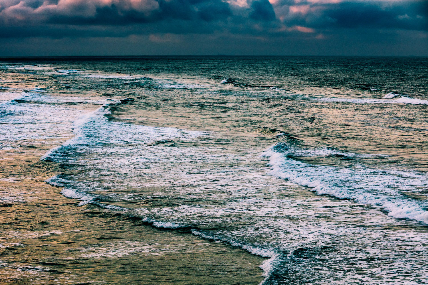"Black Sea" - I fly with friends mostly on the Black Sea coast in the North because prevailing winds in the area are northeasterly. Best flying conditions are when the wind blows from a body water. Because the water is flat and temperature is consistent the air we fly in is very smooth. That gives us a chance to fly in all hours of the day in all seasons. On one November flight the Black Sea looked especially dramatic, reflecting the late afternoon light, with a single ship hardly visible in the distance under the dark clouds.