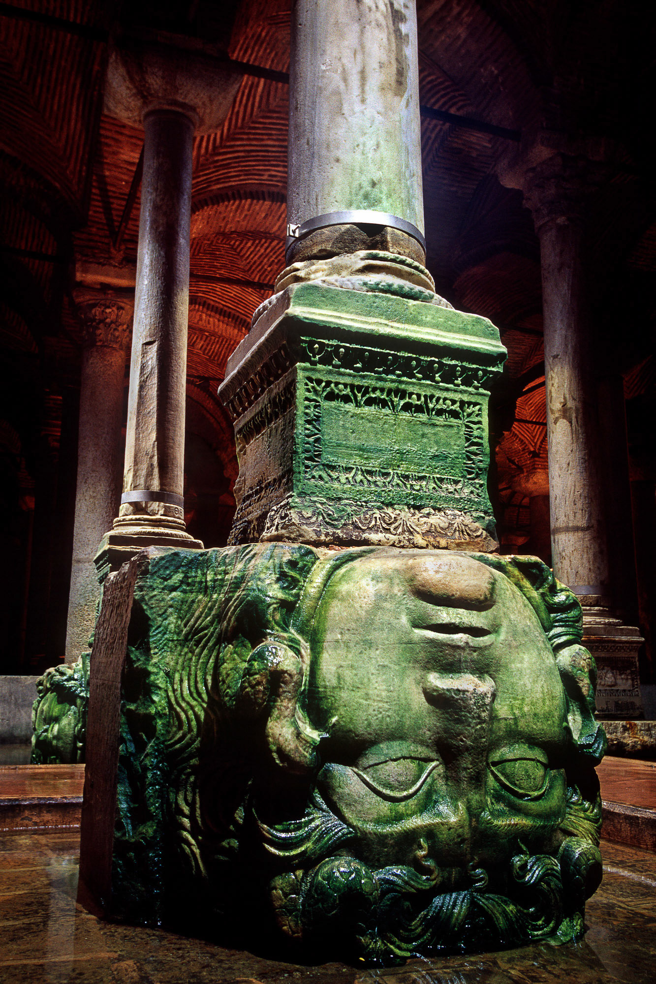 "Medusa" - The upside down Medusa head marble sculpture was used as a column base in the Basilica Cistern underground Byzantine water reservoir in Istanbul. In the old days the cistern could only be visited by boat. Remember the scene in the James Bond film From Russia with Love? Imagine the surprise of the people who drained the water some years ago when they saw the heads. What a find!