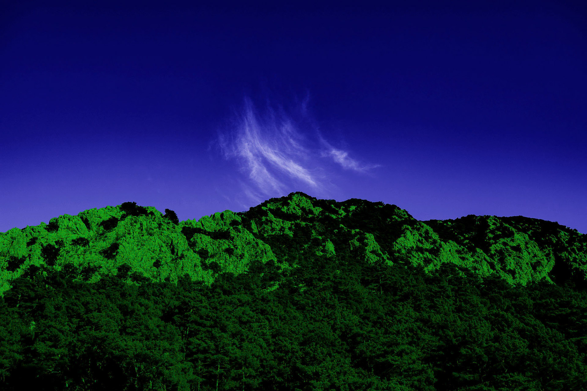 "Olympos Rising" - Spectacular rocky cliffs and pine forests of Olympos form a solid base for rising clouds.