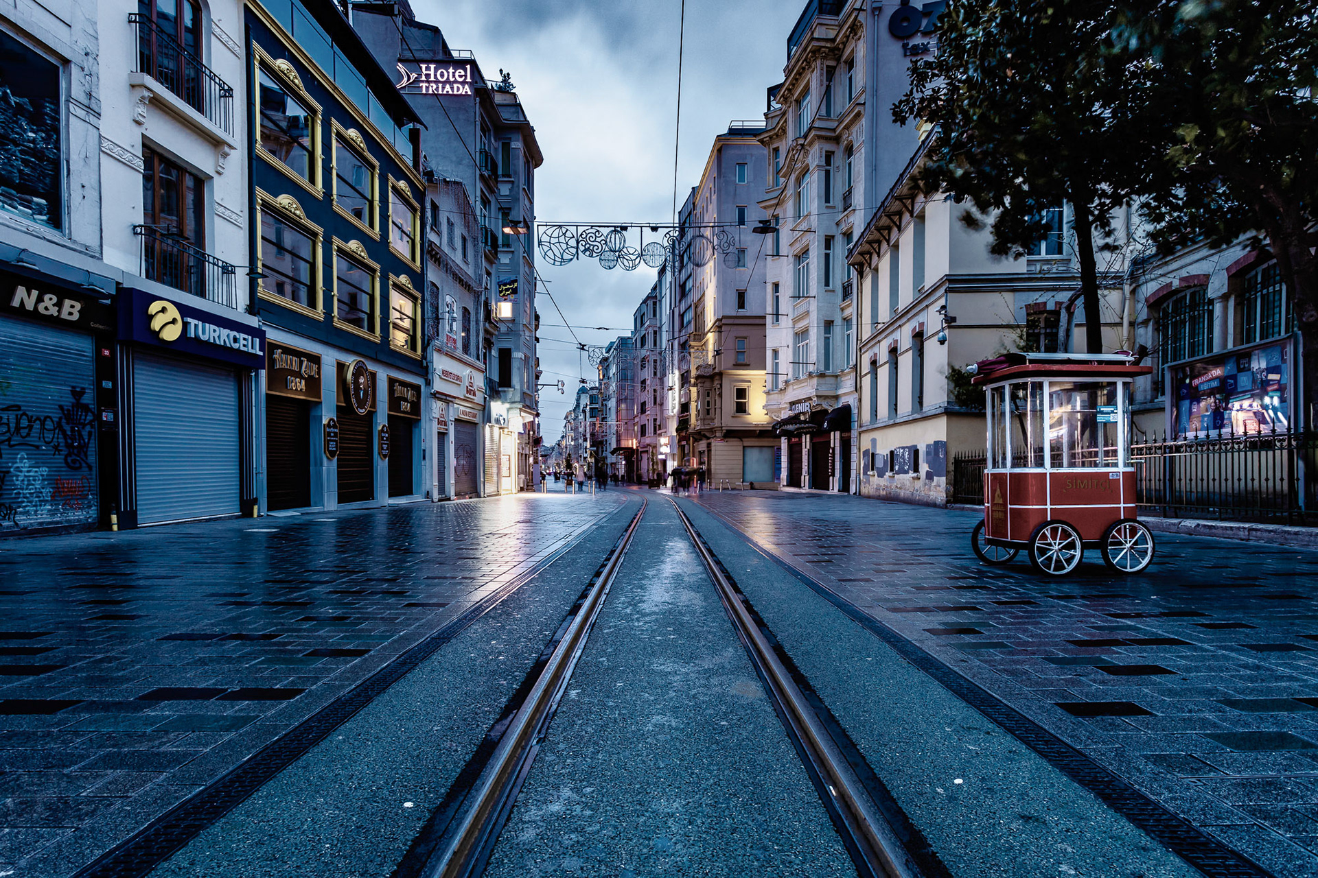 "Bare Beyoglu" - Always very busy Istiklal Street in Beyoglu is like the main street of a ghost town during the Coronavirus pandemic. The empty simit cart says it all.