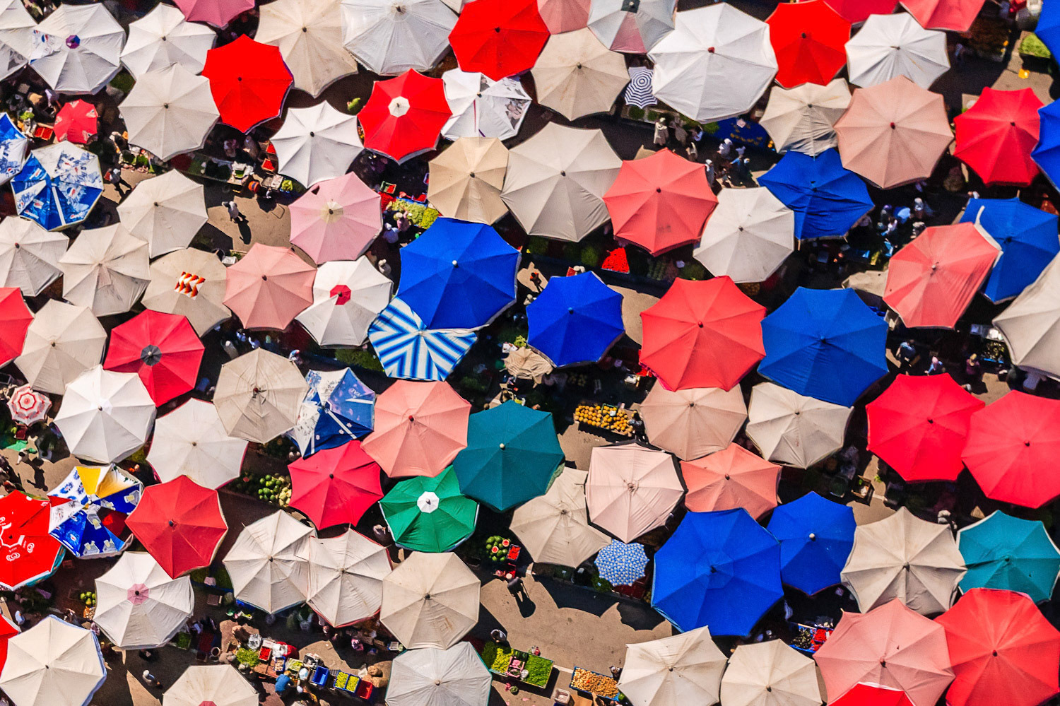 "Umbrellas" - Textures and patterns always catch my eye, especially so from directly above. How could I miss the many overlapping market umbrellas near Lake Egirdir. I love that there are basically three colors scattered randomly: Red, white and blue.