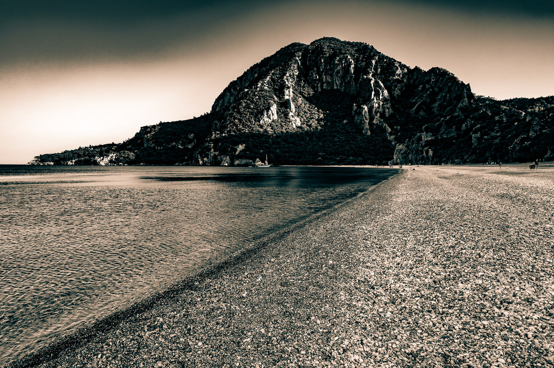 "Olympos" - Olympos Beach. Olympos was an ancient city in Lycia. It was situated in a river valley near the coast. Its ruins are located south of the modern town Çıralı in the Kumluca district of Antalya Province, Turkey.