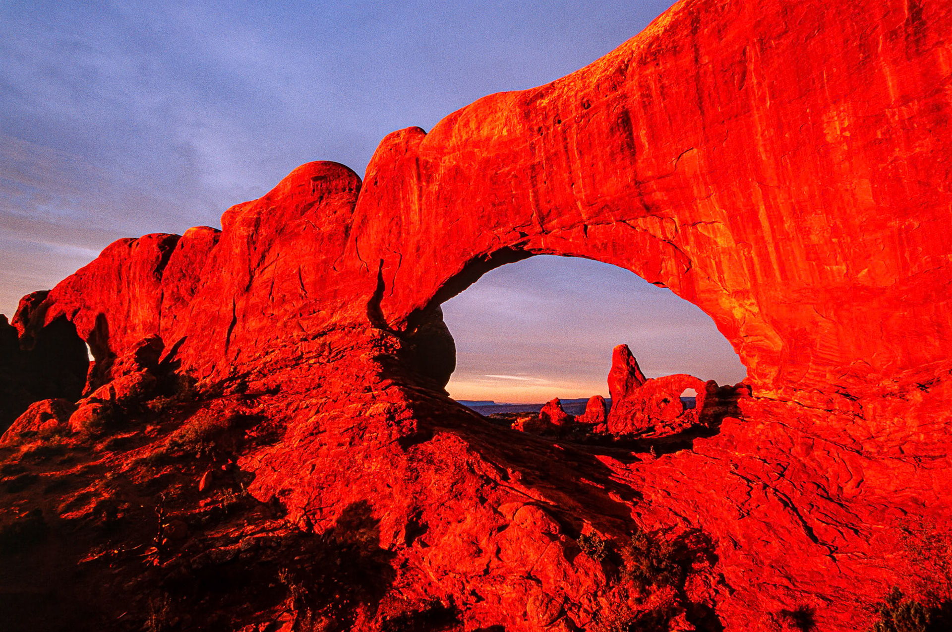 "North and South Windows" - North and South Windows at the Arches National Park in Utah, USA. Those rocks glow, I mean really glow at sunrise. When one is serious about photography one learns early on the importance of sunrises and sunsets. You get up while it is still dark, find your spot, set up your camera and wait. Breakfast comes later.