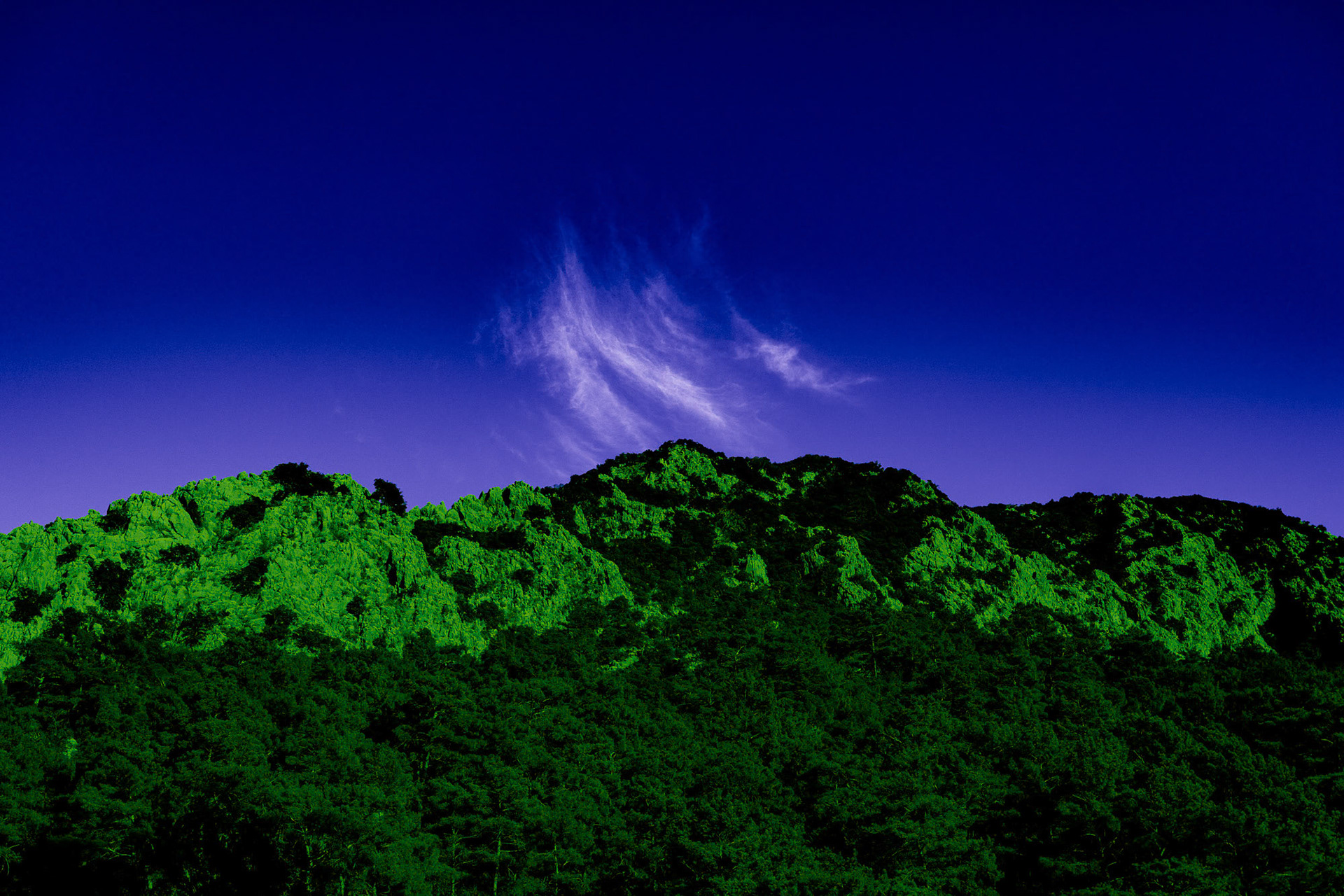 "Olympos Rising" - Spectacular rocky cliffs and pine forests of Olympos form a solid base for rising clouds.