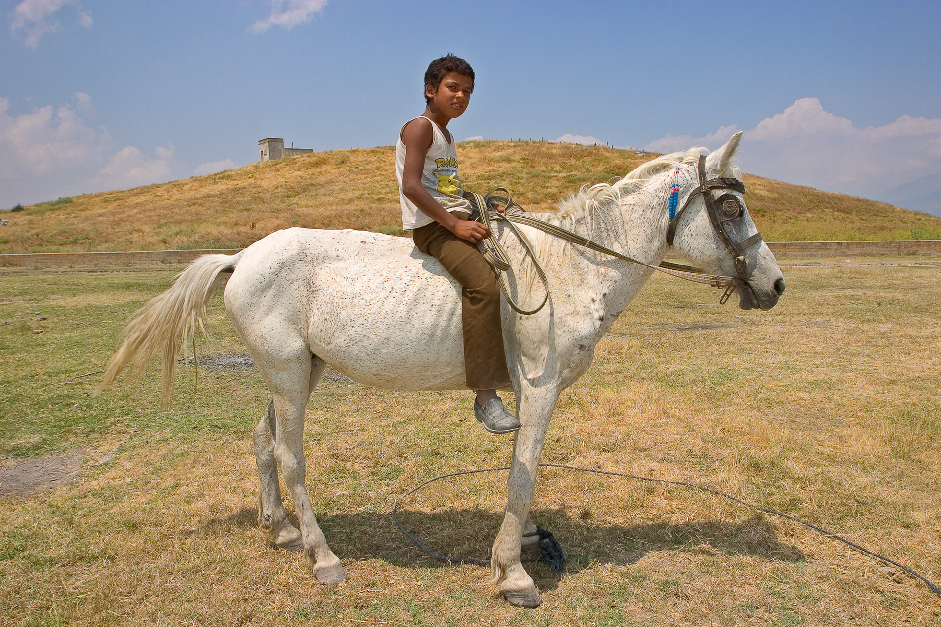 "Boz Mound" - Gypsies were camping next to Boz Mound and this gypsy boy proudly sitting on his white horse made the perfect foreground.