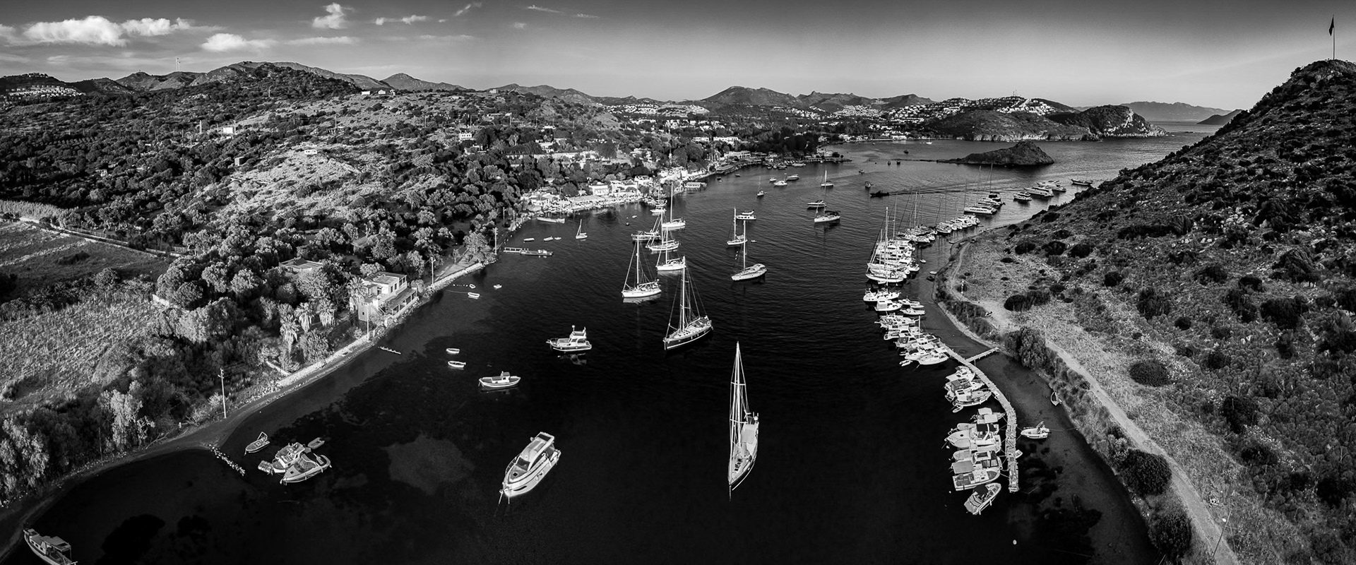 "Gumusluk" - Aerial panorama view of Gumusluk village in Bodrum that is popular with Istanbulites and sailors.
