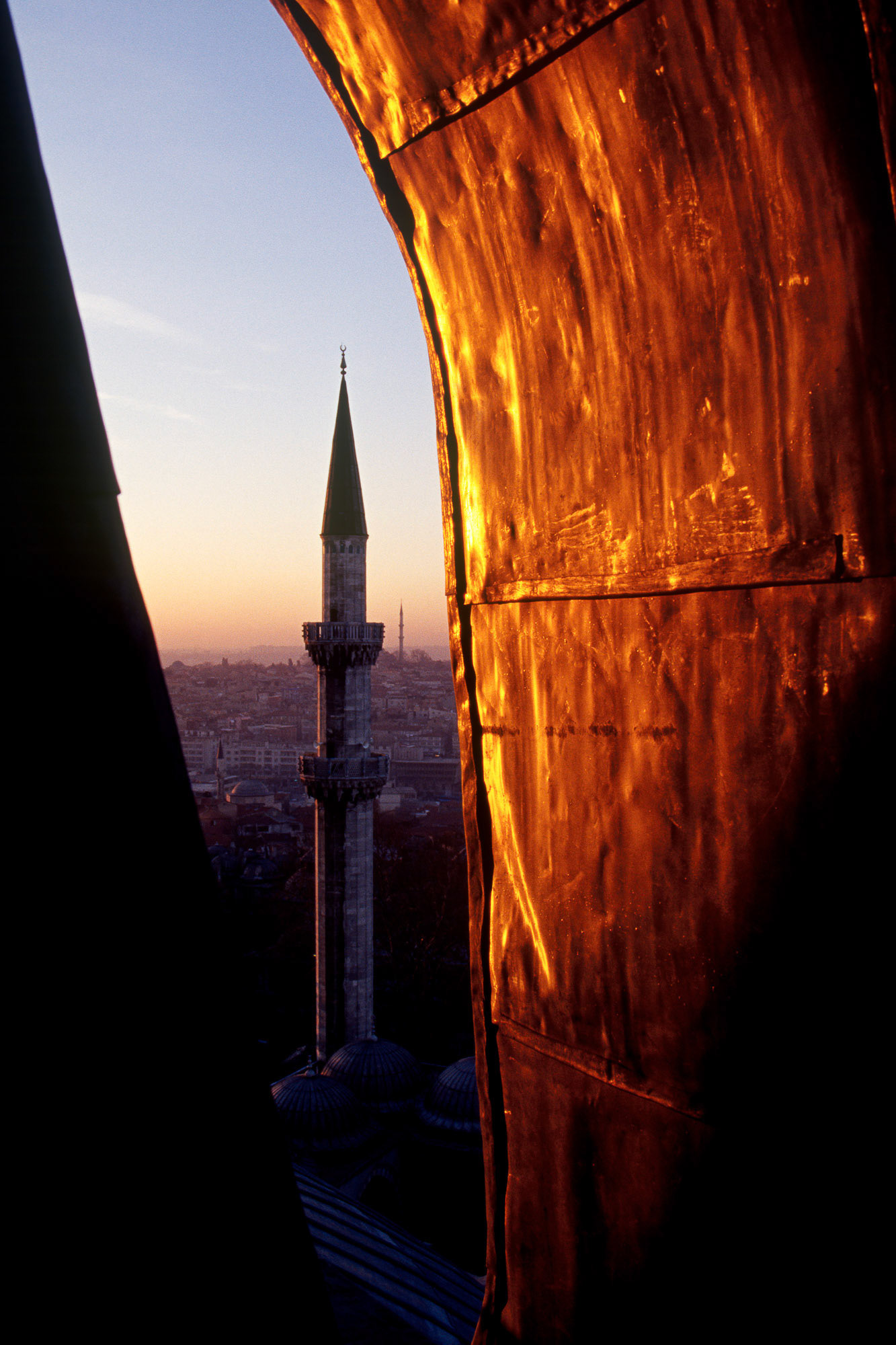 "Glow" - The lead panel covering on the roof of the Suleymaniye Mosque presented me with a reddish coppery reflection of the setting sun. Timing is everything!