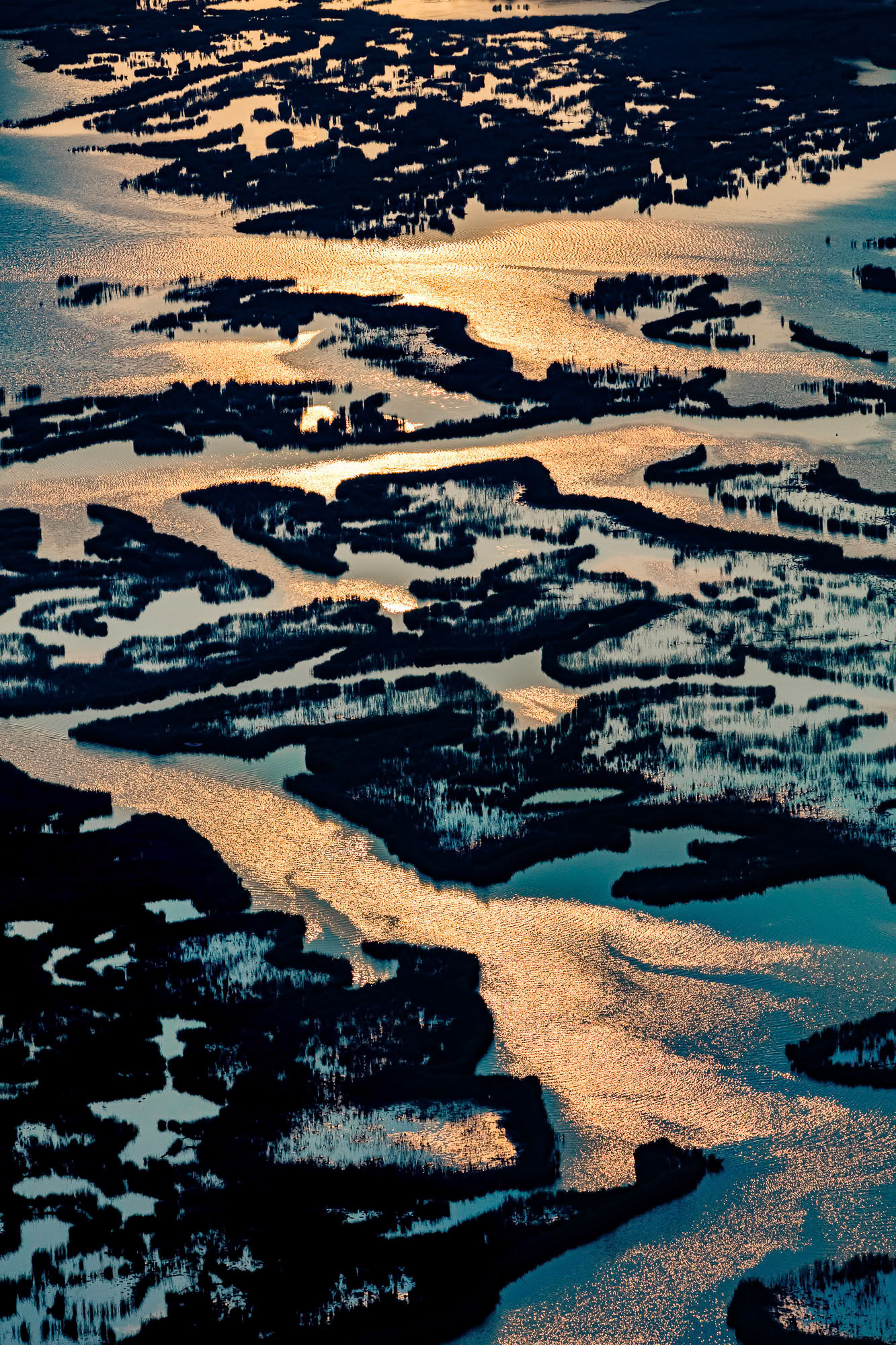"The Planet We Live On" - Dalyan is one of my favorite areas to fly over. The magical geography, the time of the day, the angle, the shades of yellow and blue, and contrasting light and dark tones all came together for this earthly image.