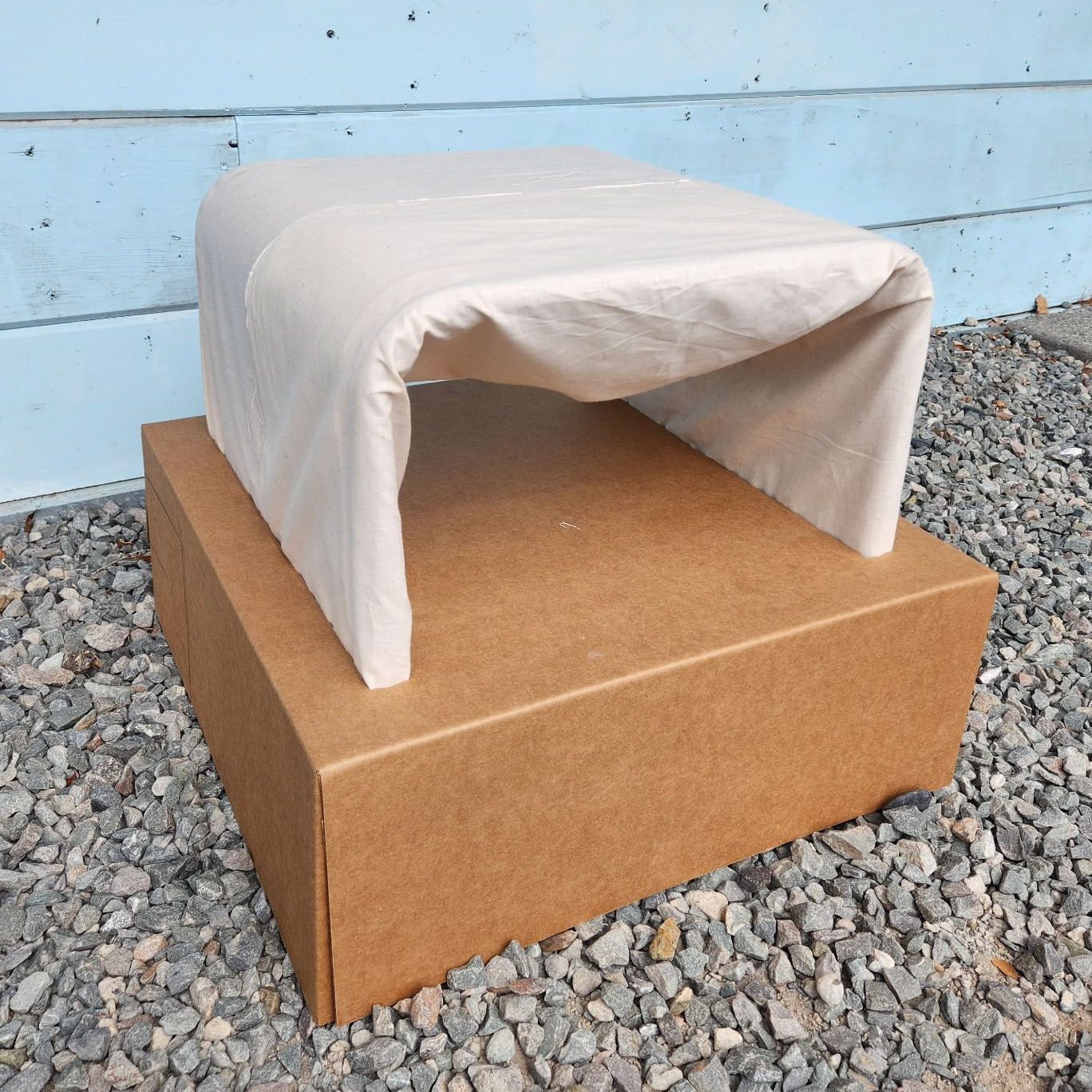 The die cut tray holds the bottom of the stool in place