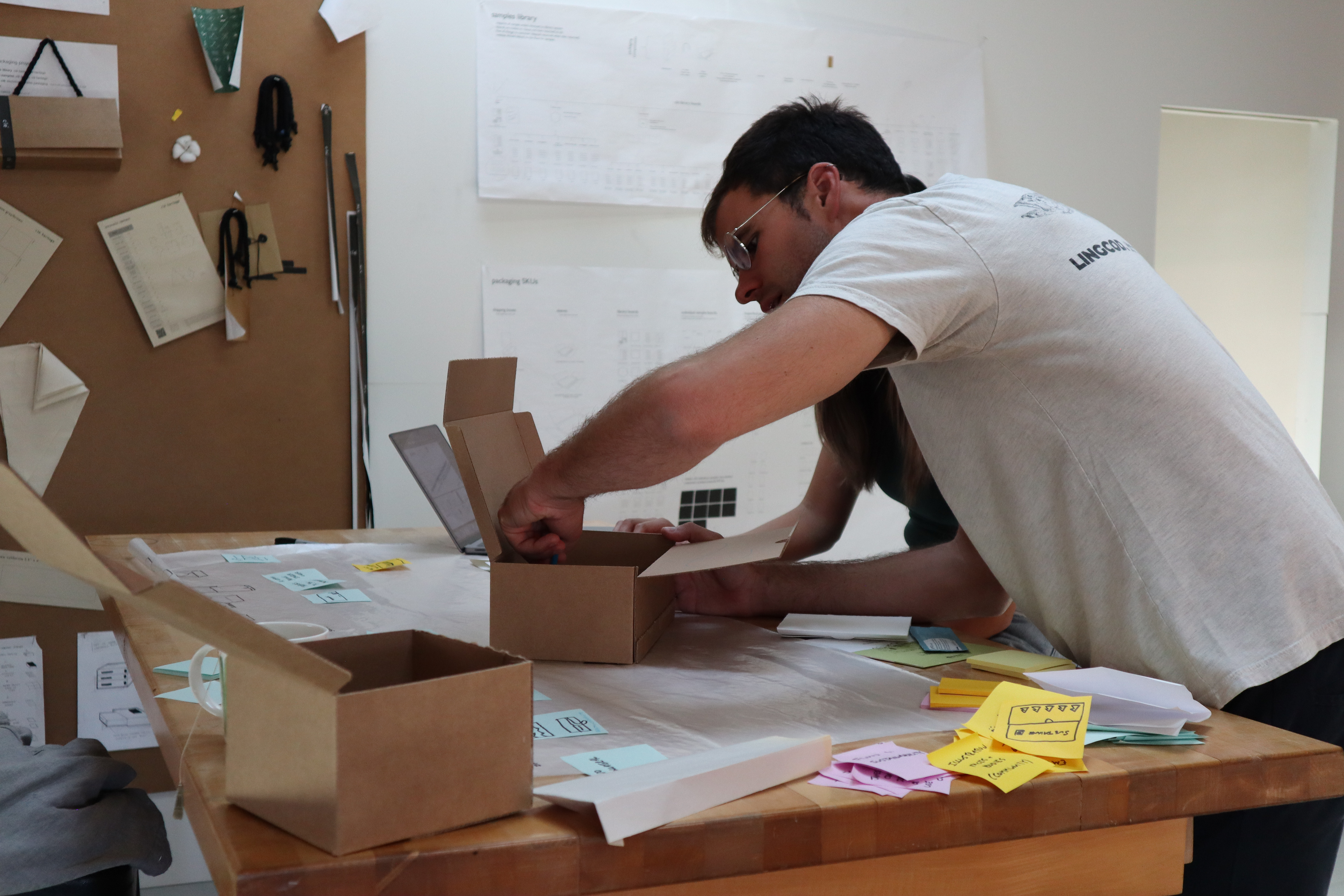 Ian Montgomery, founder and creative director at Guacamole Airplane, conceptualizing graphic flows with me on physical prototypes.