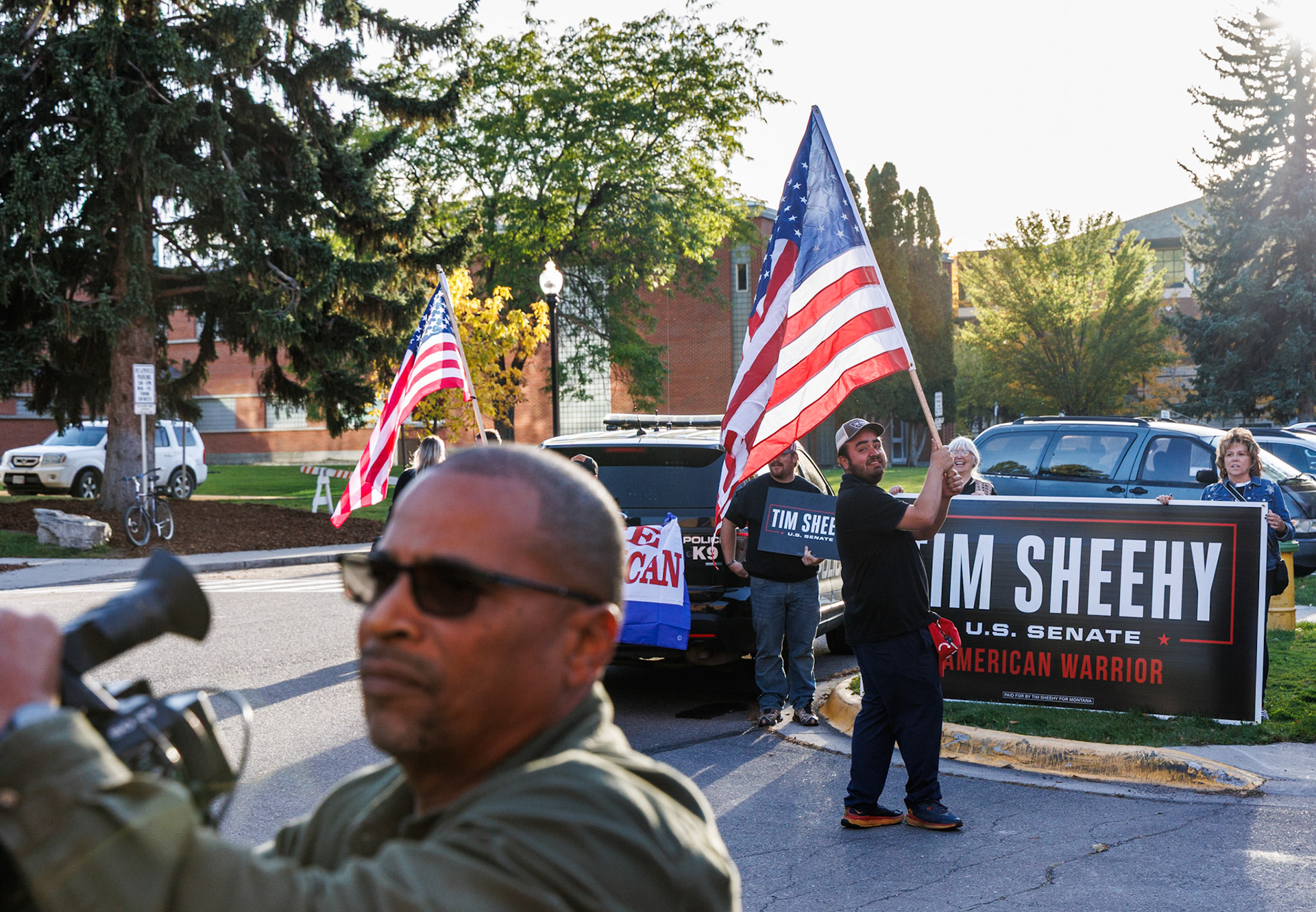 A group of Montanans show their support for Republican senate nominee Tim Sheehy before his debate with incumbent senator John Tester (D) in Missoula MT, on Sep. 30, 2024. Press documented the demonstration, which took place outside of the PARTV building on the University of Montana campus.