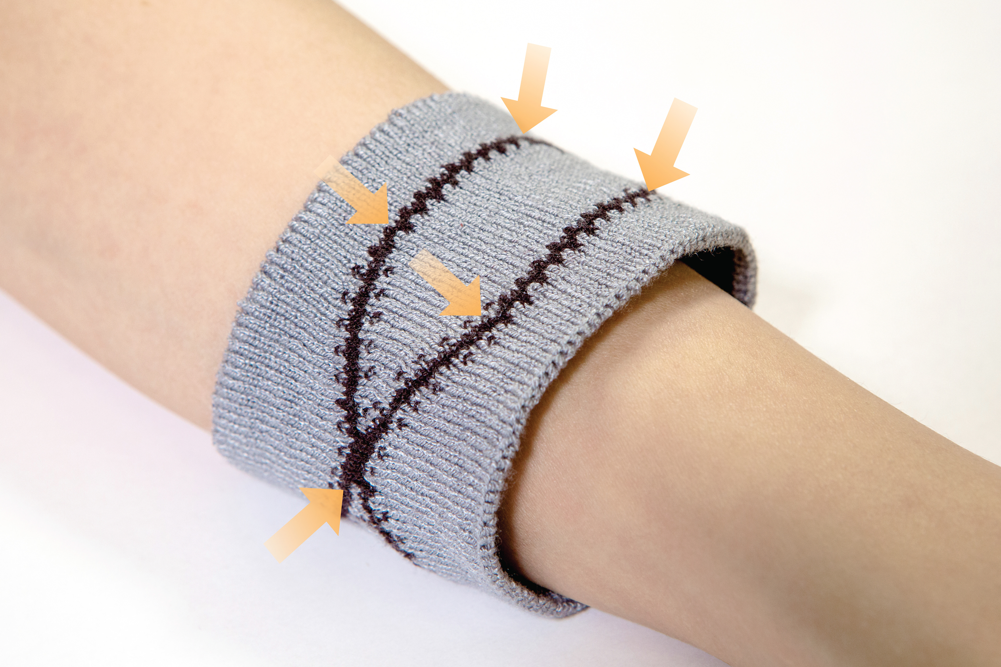 KnitDermis compression interface during actuation while worn on the forearm.