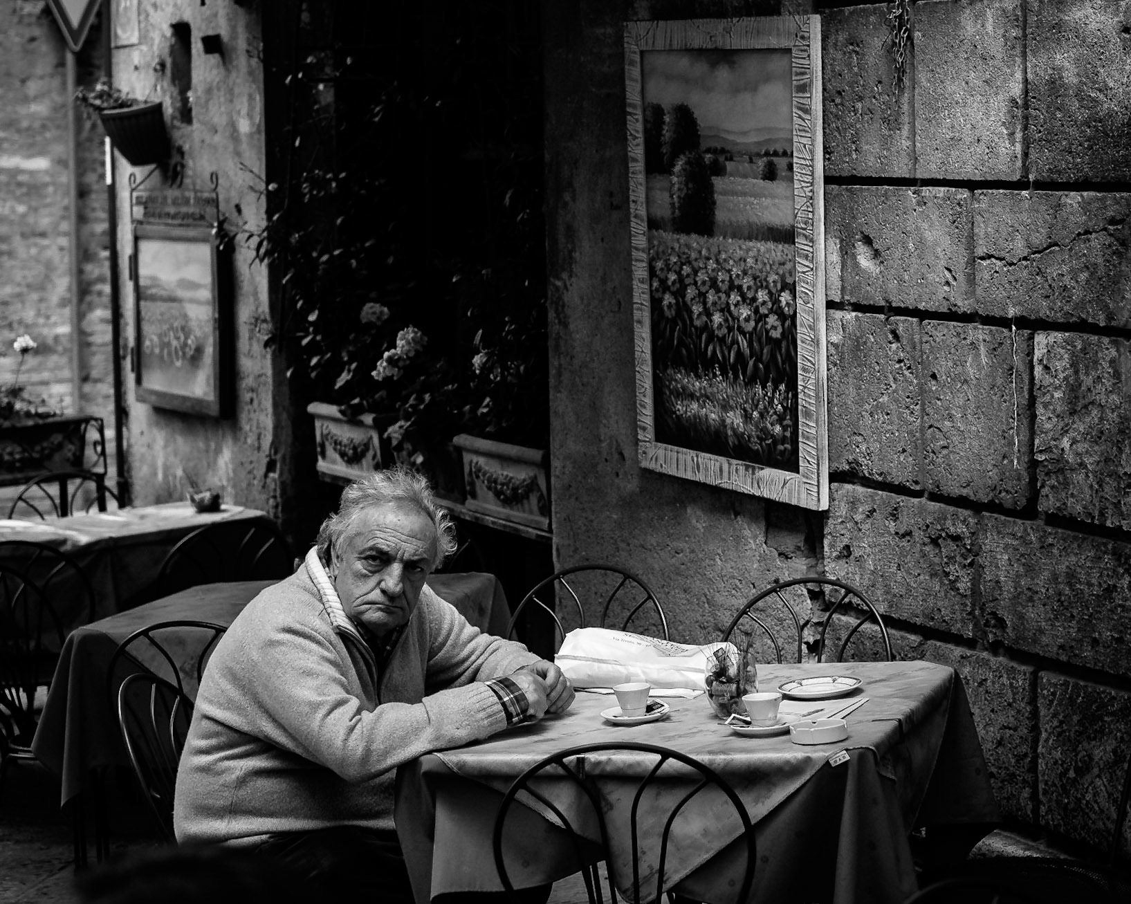 Old Man In Cafe