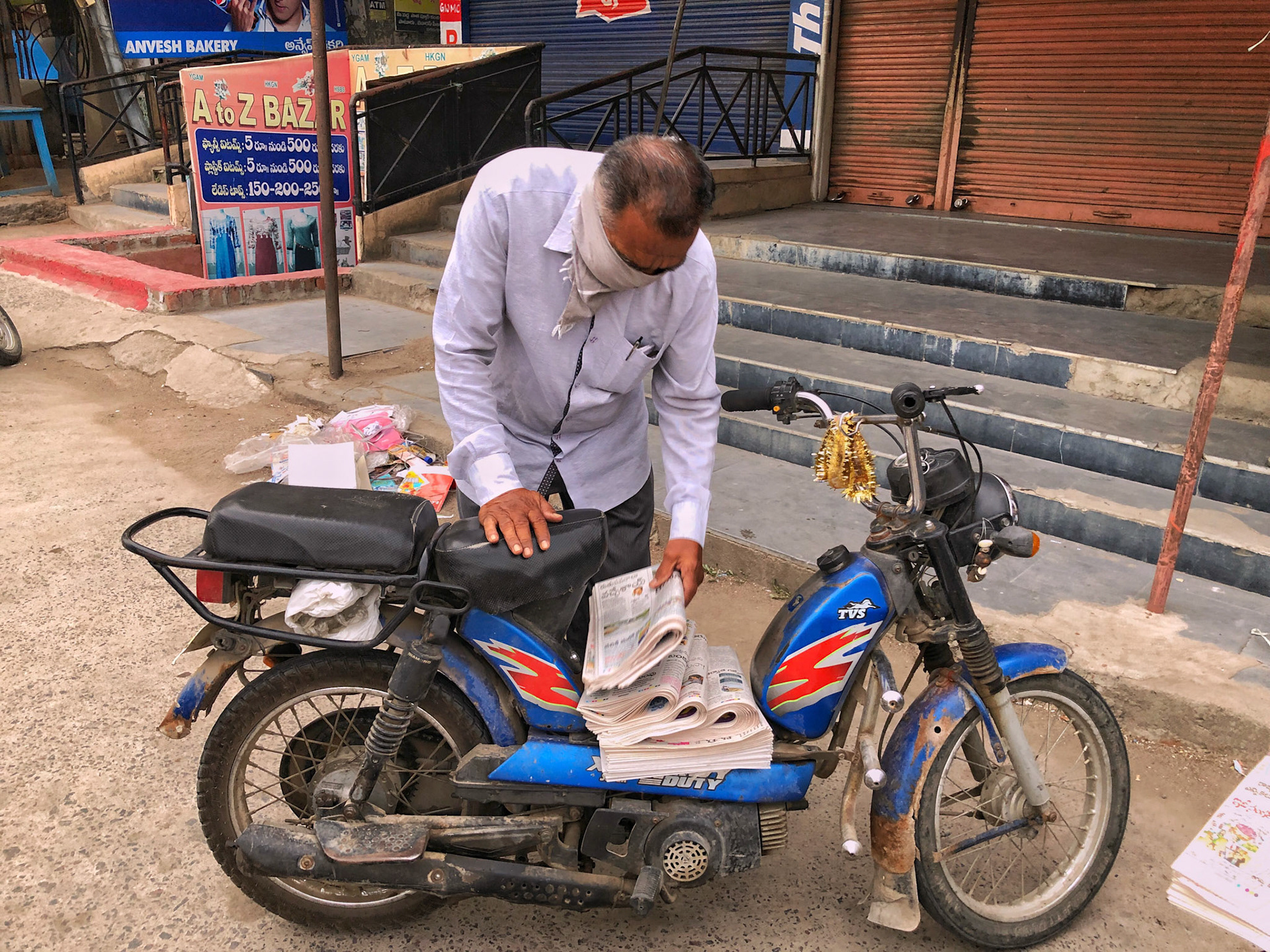 They call him "Kaka". He is 72 & he is circulating newspaper sets for past 60 years. RESPECT.