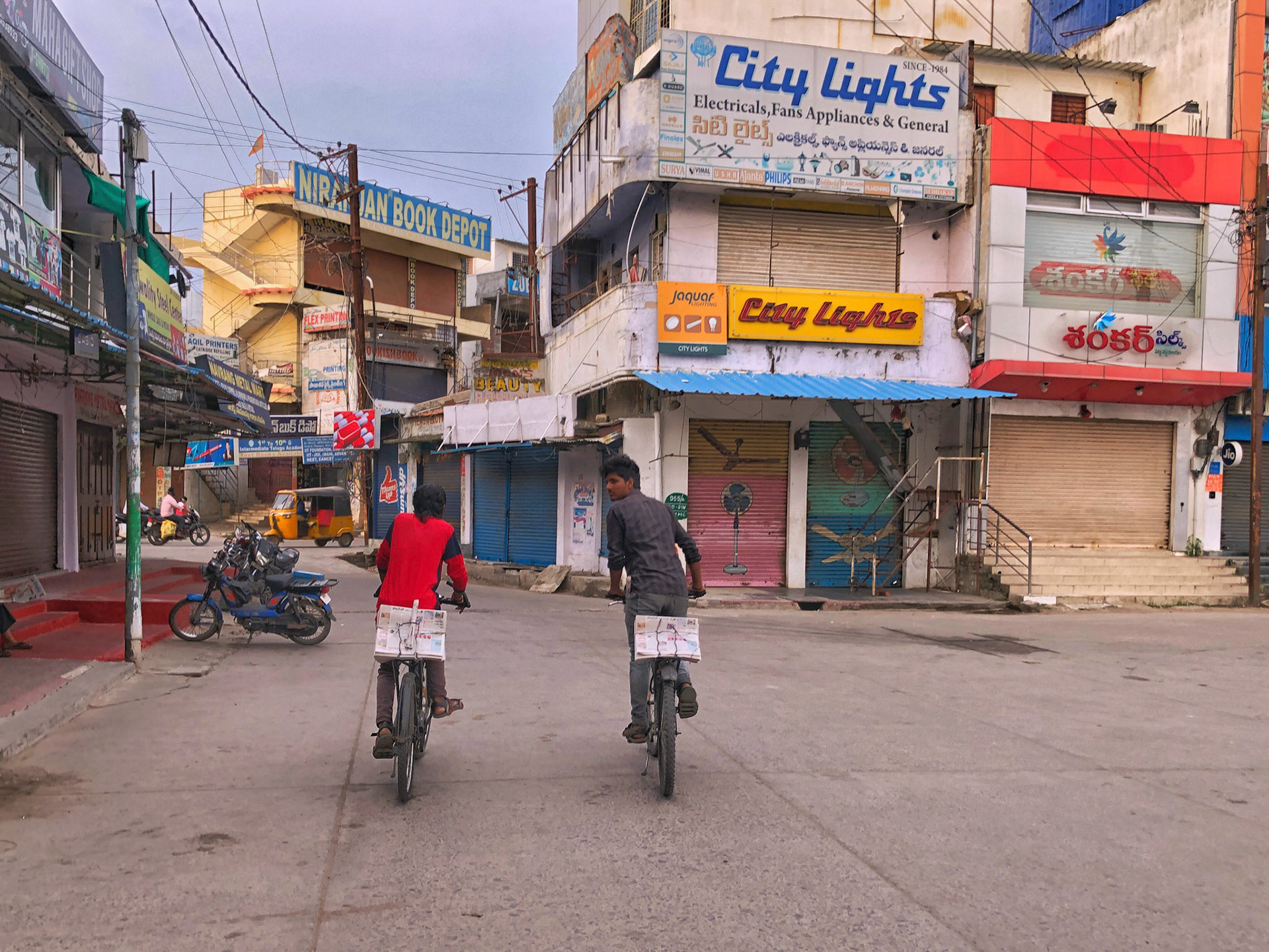 Paperboys taking off for their circulation route. Each paperboy is dedicated to a route and circulates 150-200 copies daily. It takes them around 60-90mins to complete for the circulation.