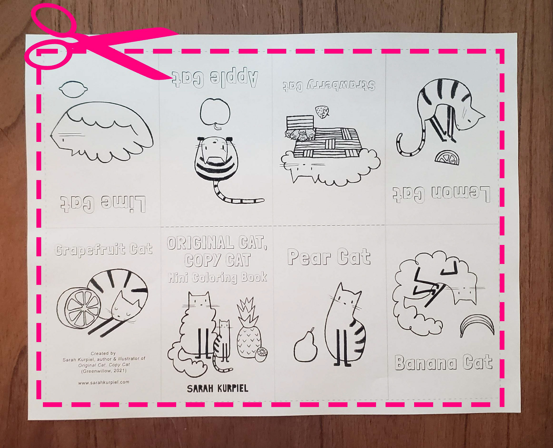 Mini coloring book with a dotted line showing where to cut with scissors