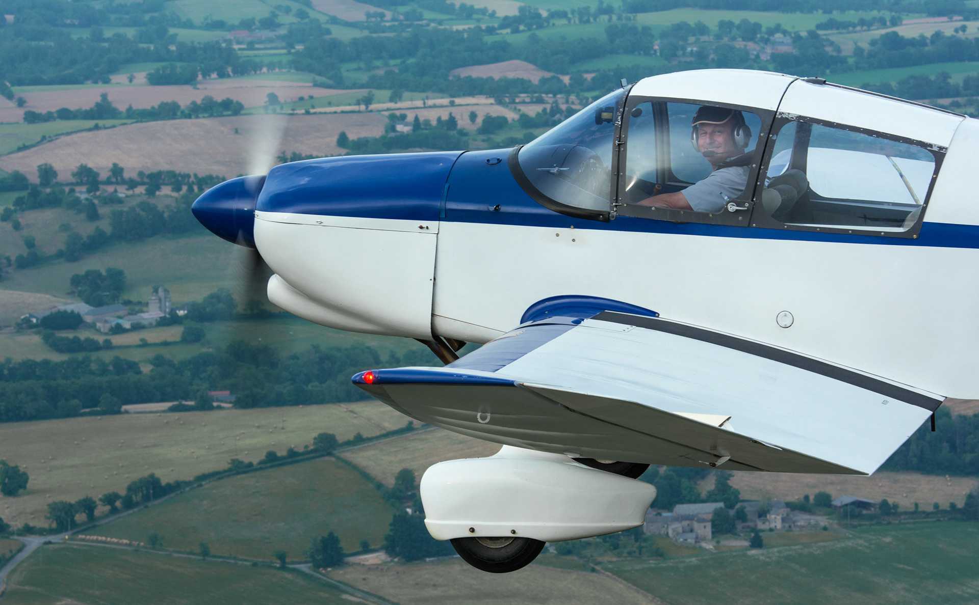 A happy instructor in a Jodel Dr1050 over southern France
