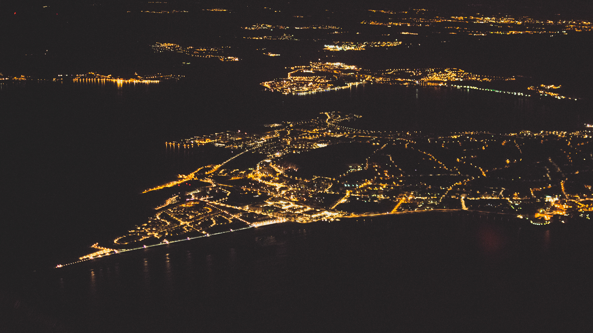 Night flying along the coastline