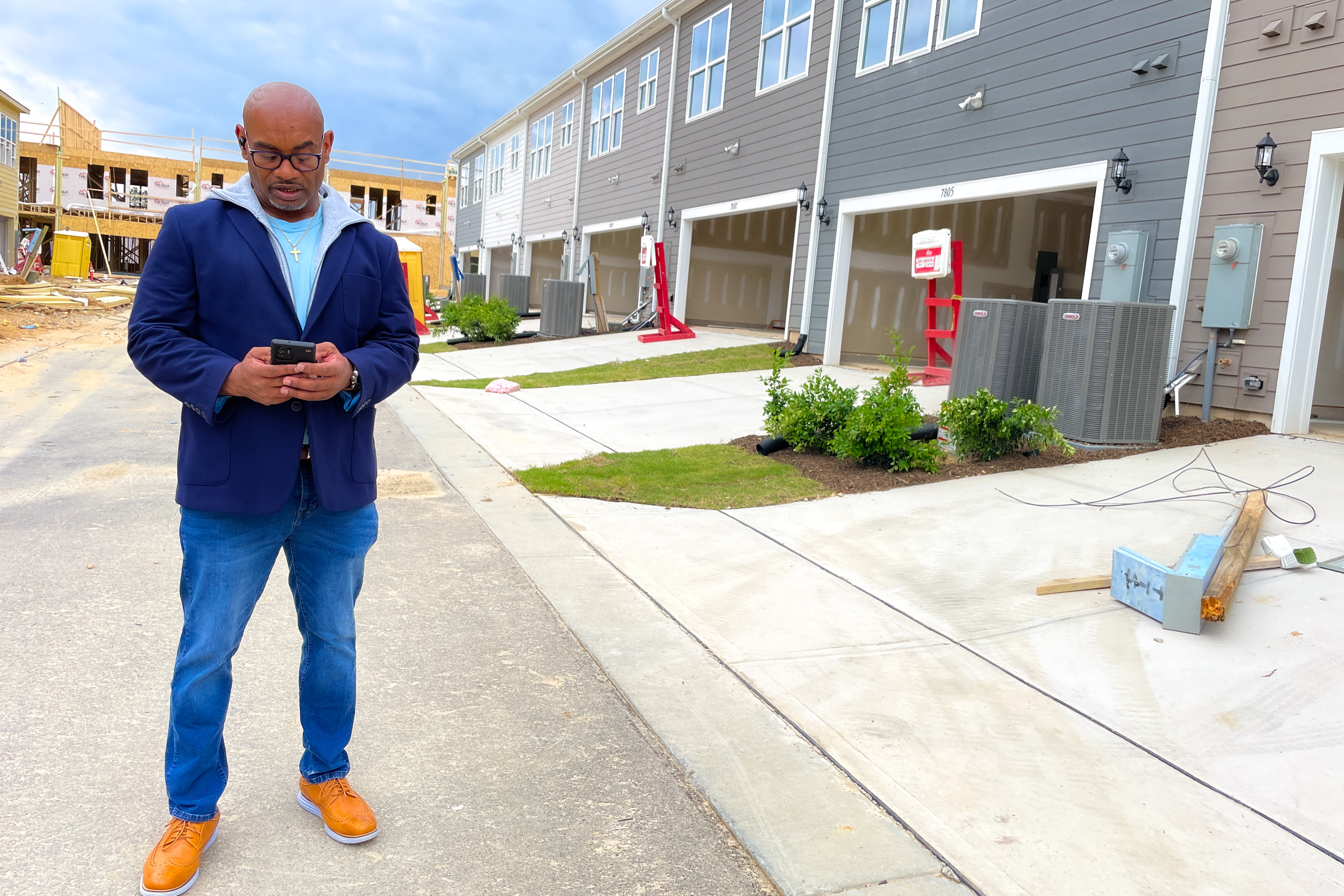 Shawn Mclean verifies his appointments and checks his emails for any unexpected changes on April 16, 2023, in Knightdale, NC. Appointments and even walkthroughs must be scheduled ahead of time in order to monitor any visitor activity while residences are left open with equipment in the neighborhood. (Photo by Jamesha Robinson)