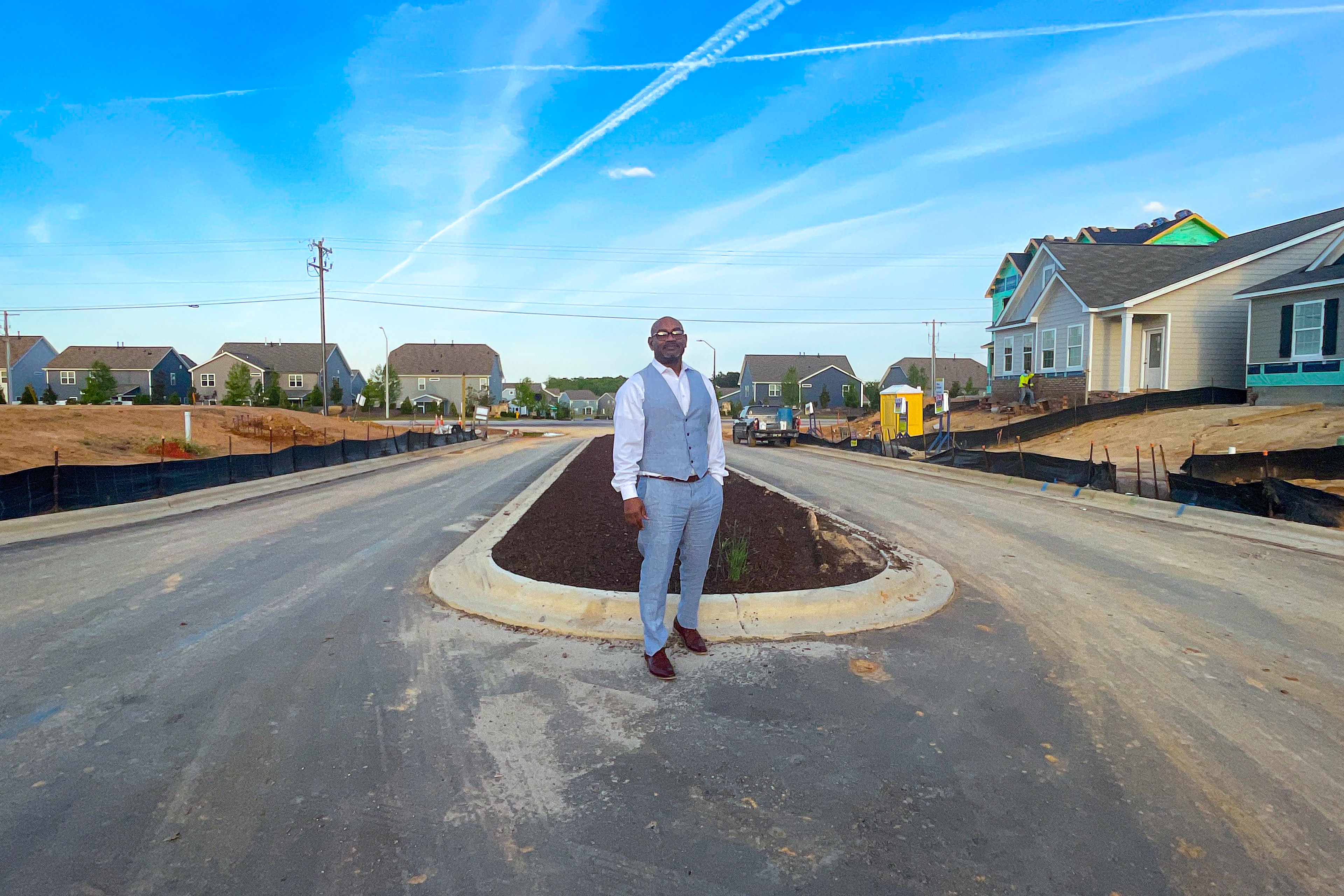 Shawn Mclean checks out a new development and homebuilder, D.R. Horton, on April 24, 2023 in Knightdale, NC. D.R. Horton is making headlines by shaking off high interest rates in hopes to prepare for new buyers. (Photo by Jamesha Robinson)
