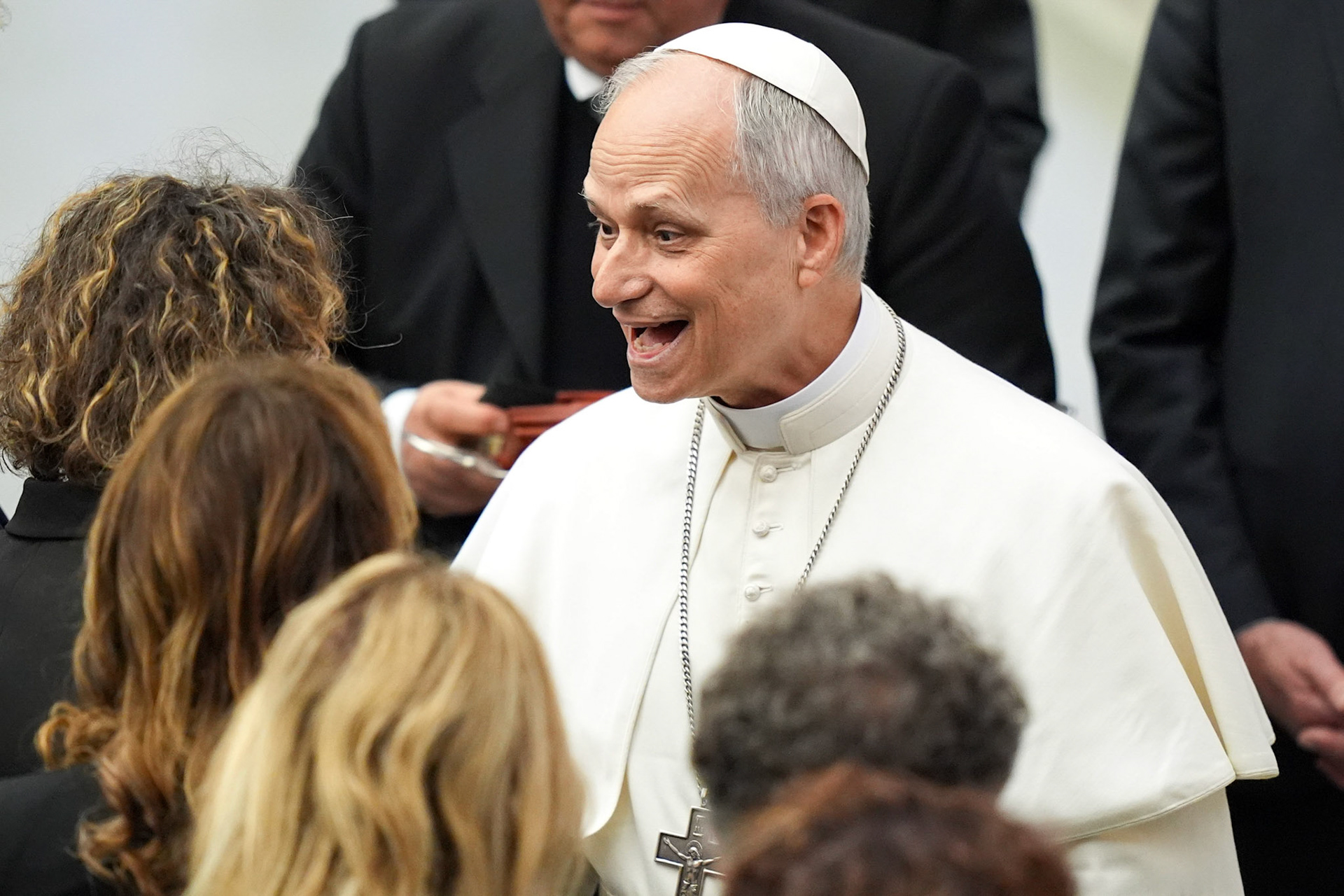 Pope Leo XIV greets representatives of the media who covered his election in the Paul VI Audience Hall at the Vatican May 12, 2025. (CNS photo/Lola Gomez)
