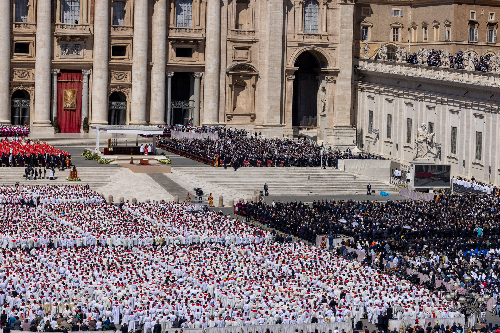 Hundreds of priests, wearing white albs and red stoles, concelebrate the funeral Mass of Pope Francis in St. Peter's Square at the Vatican April 26, 2025. (CNS photo/Pablo Esparza)