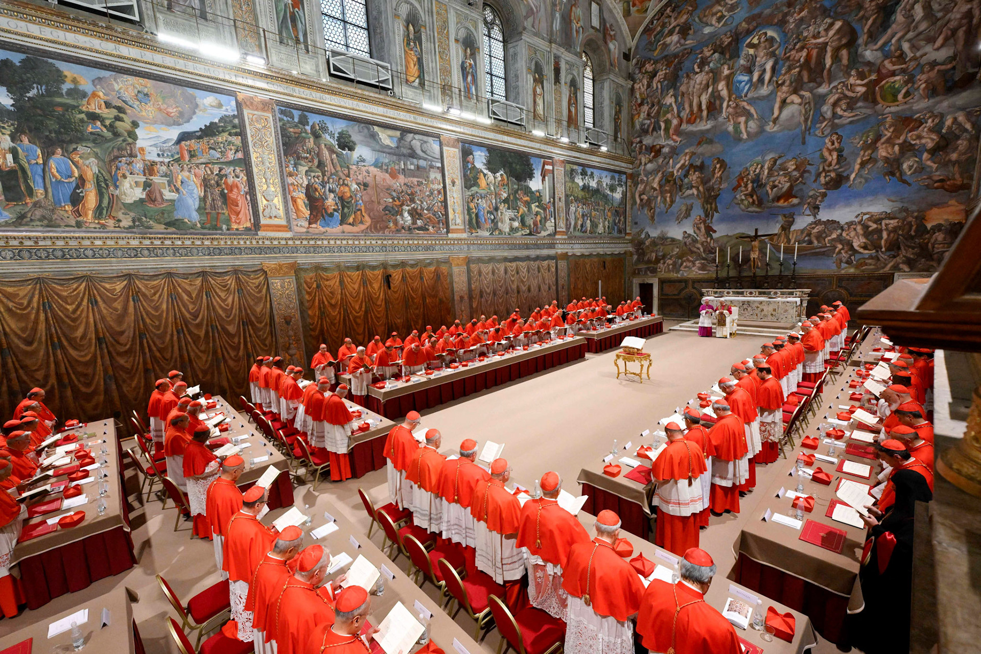 Pope Leo XIV, right, stands in the Sistine Chapel among cardinals after being elected at the Vatican, May 8, 2025. He became the first American pope in history. (OSV News photo/Francesco Sforza, Vatican Media via Reuters)