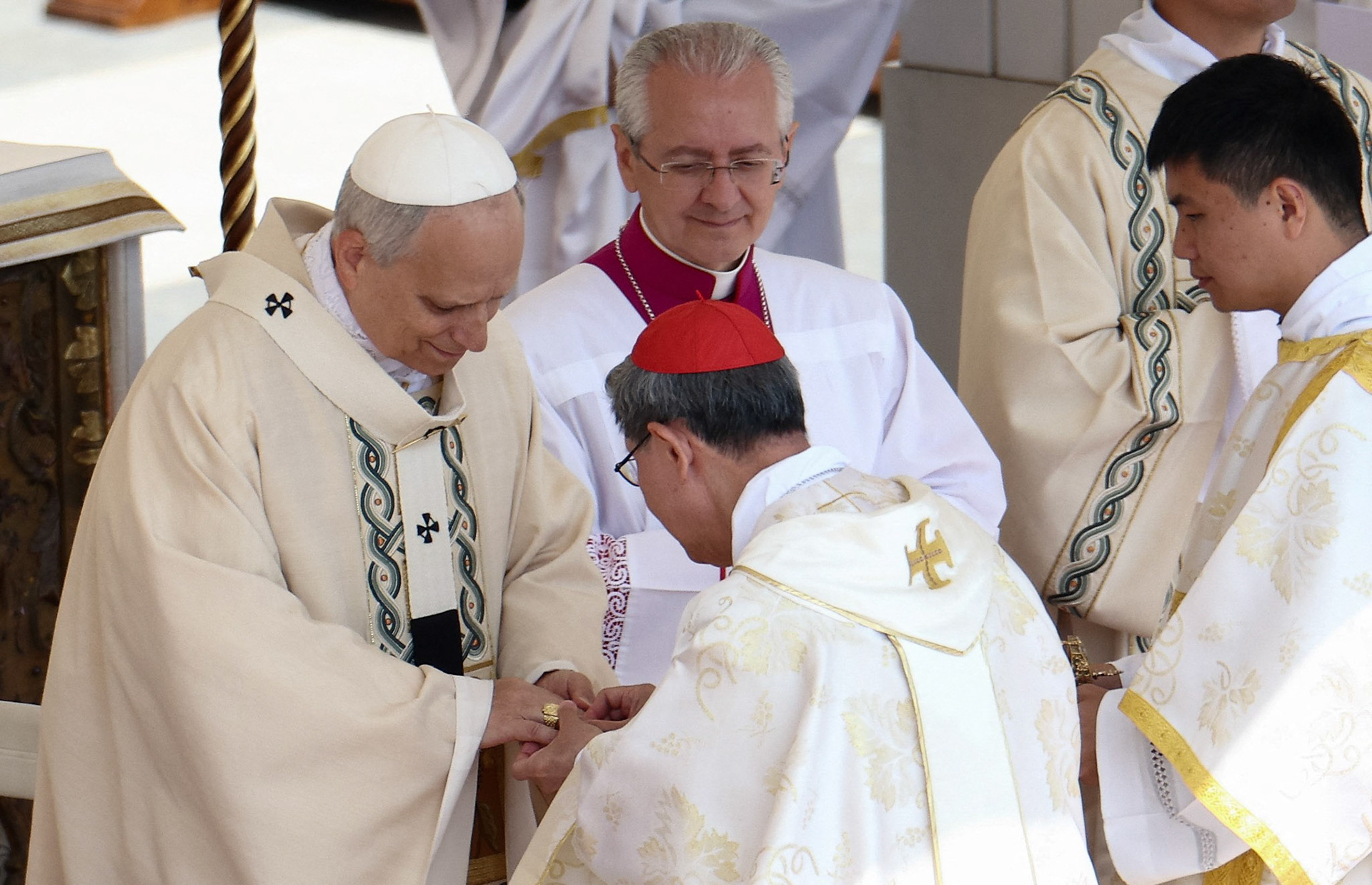 Cardinal Luis Antonio Tagle, pro-prefect of the Dicastery for Evangelization under Pope Francis, places the papal fisherman's ring on Pope Leo XIV, formerly Cardinal Robert Francis Prevost, as the pontiff celebrates his inauguration Mass at the Vatican May 18, 2025. He is the first American pope in history. (OSV News photo/Guglielmo Mangiapane, Reuters)