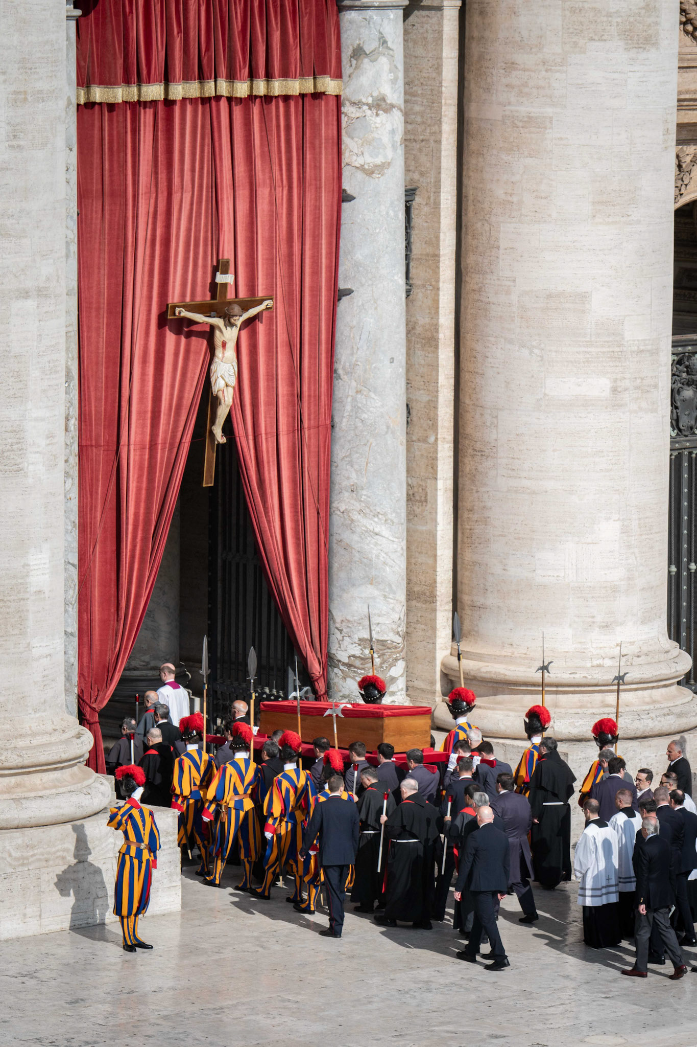Pallbearers carry the body of Pope Francis in an open casket into St. Peter’s Basilica at the Vatican April 23, 2025, following a procession through St. Peter’s Square. (CNS photo/Cristian Gennari, pool)
