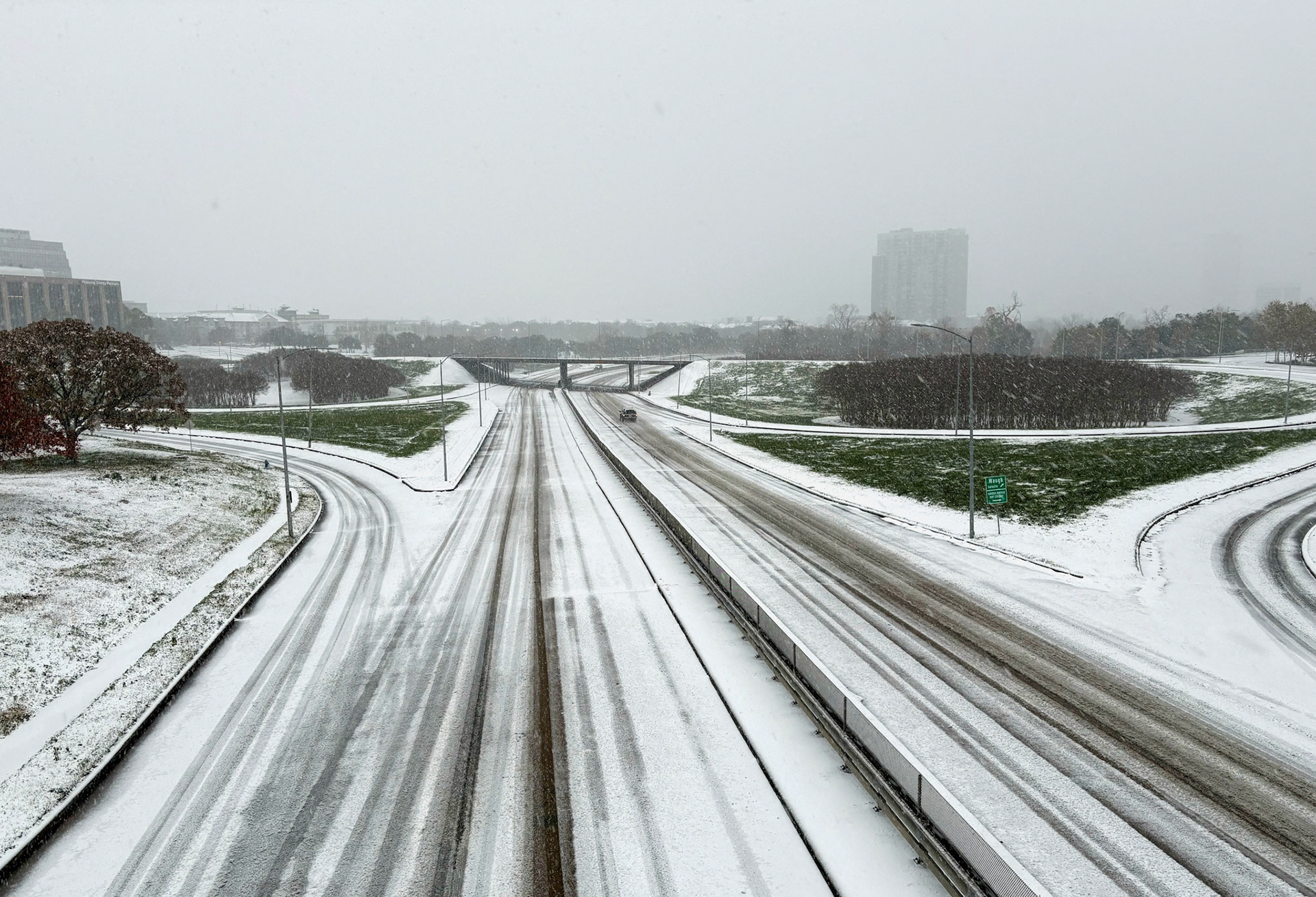 Memorial Drive, a main road in Houston, is seen Jan. 21, 2025, covered in snow and empty during peak traffic hours as winter storm Enzo passes through the city. A rare frigid storm charged through Texas and the northern Gulf Coast, blanketing New Orleans and Houston with snow, closing highways, grounding nearly all flights and canceling school for millions of students more used to hurricane dismissals than snow days. (OSV News photo/Arathy Somasekhar, Reuters)