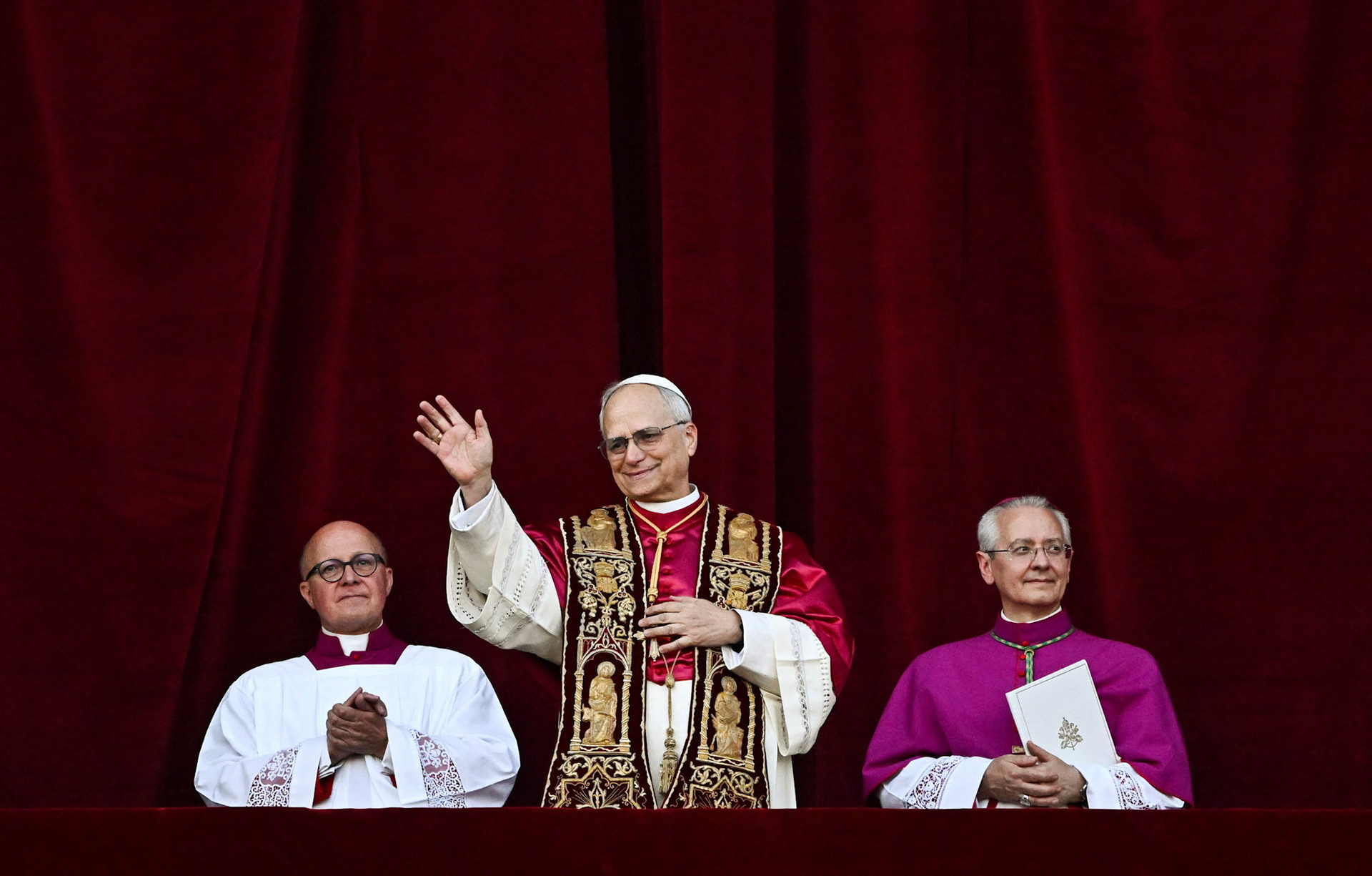 Cardinal Robert Francis Prevost, who has chosen the papal name Leo XIV, appears on the central balcony of St. Peter's Basilica at the Vatican May 8, 2025, following his election during the conclave. He is the first American pope in history. (OSV News photo/Claudia Greco, Reuters)