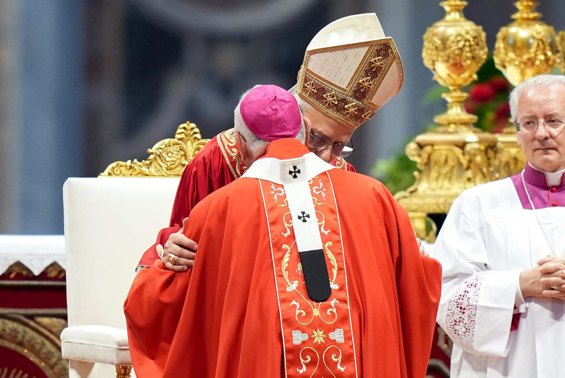 Pope Leo XIV and Archbishop Joe S. Vásquez of Galveston-Houston exchange the sign of peace after receiving the pallium during Mass in St. Peter’s Basilica at the Vatican June 29, 2025, the feast of Sts. Peter and Paul. The pallium symbolizes the archbishop’s authority and unity with the pope. (CNS photo/Lola Gomez)
