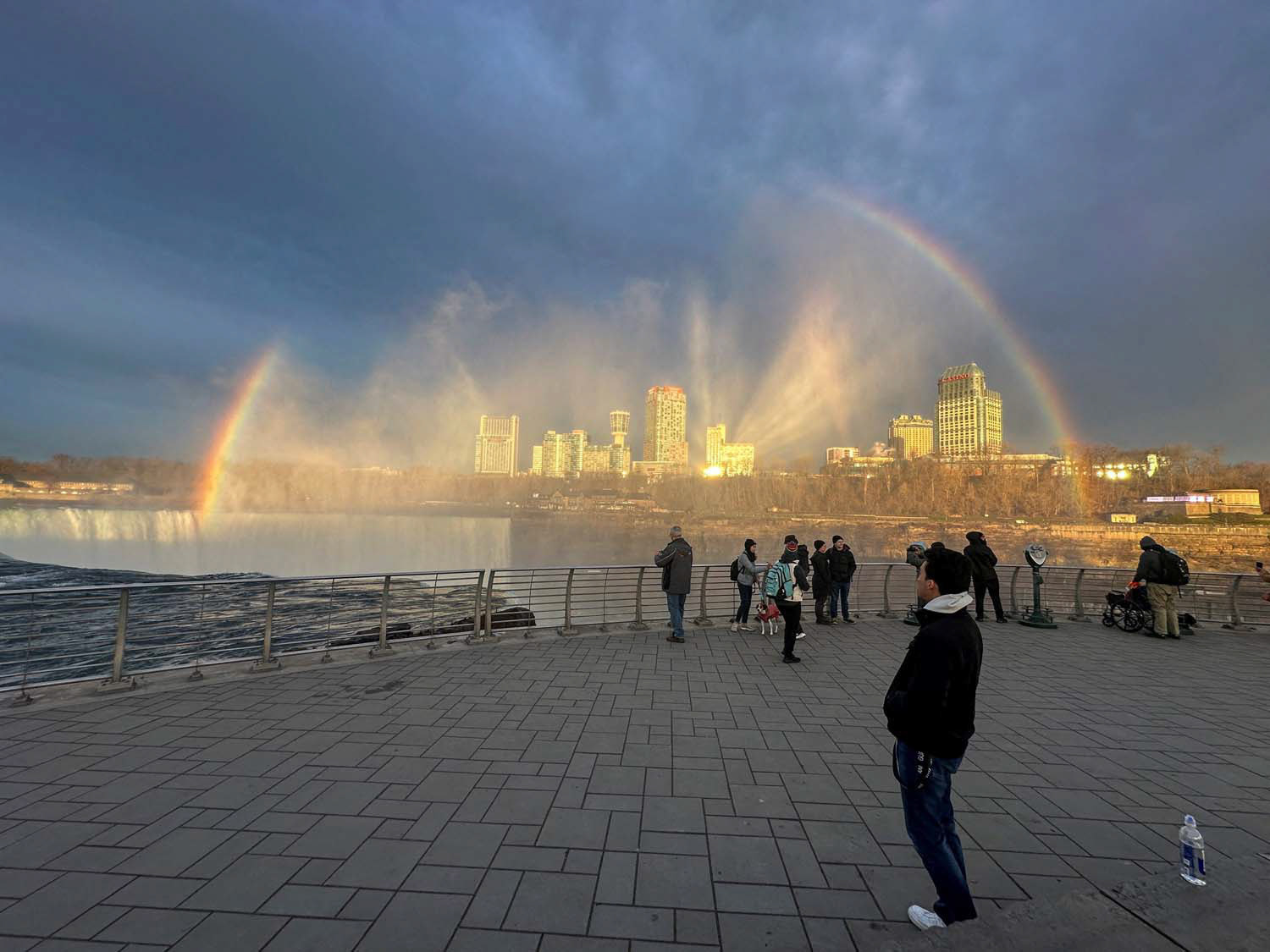 Rainbow forms over Niagara Falls in New York April 8, 2024, as people wait at Niagara Falls to view the total solar eclipse. (OSV News photo/Aleksandra Michalska, Reuters)
